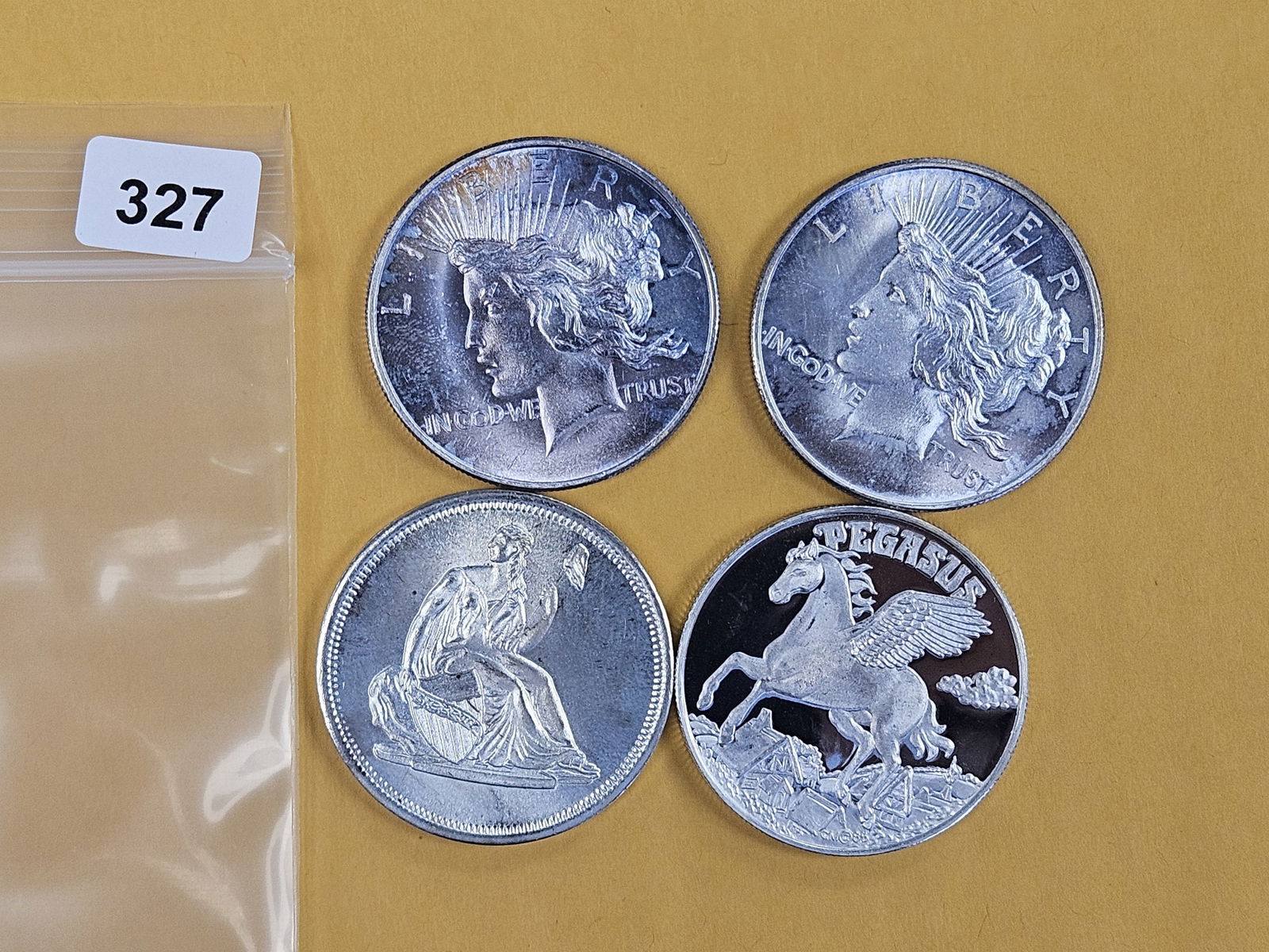 Four 1-troy ounce .999 fine silver art rounds: Mixed 