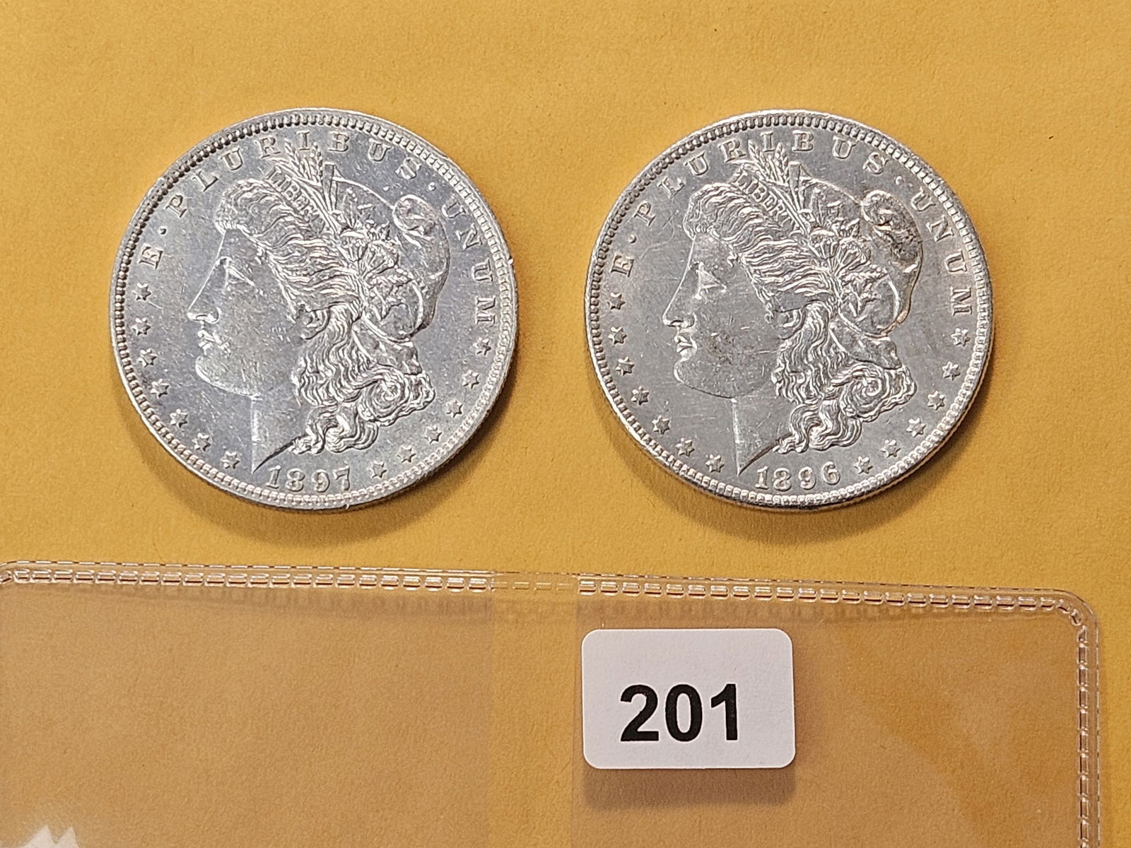 Two About Uncirculated Morgan Silver Dollars (1 of 4)