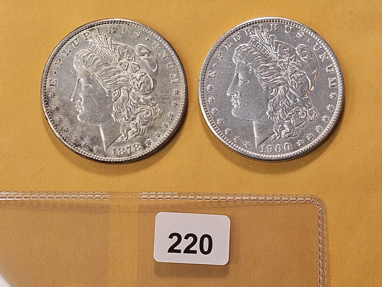 Two About Uncirculated Morgan Silver Dollars (1 of 4)