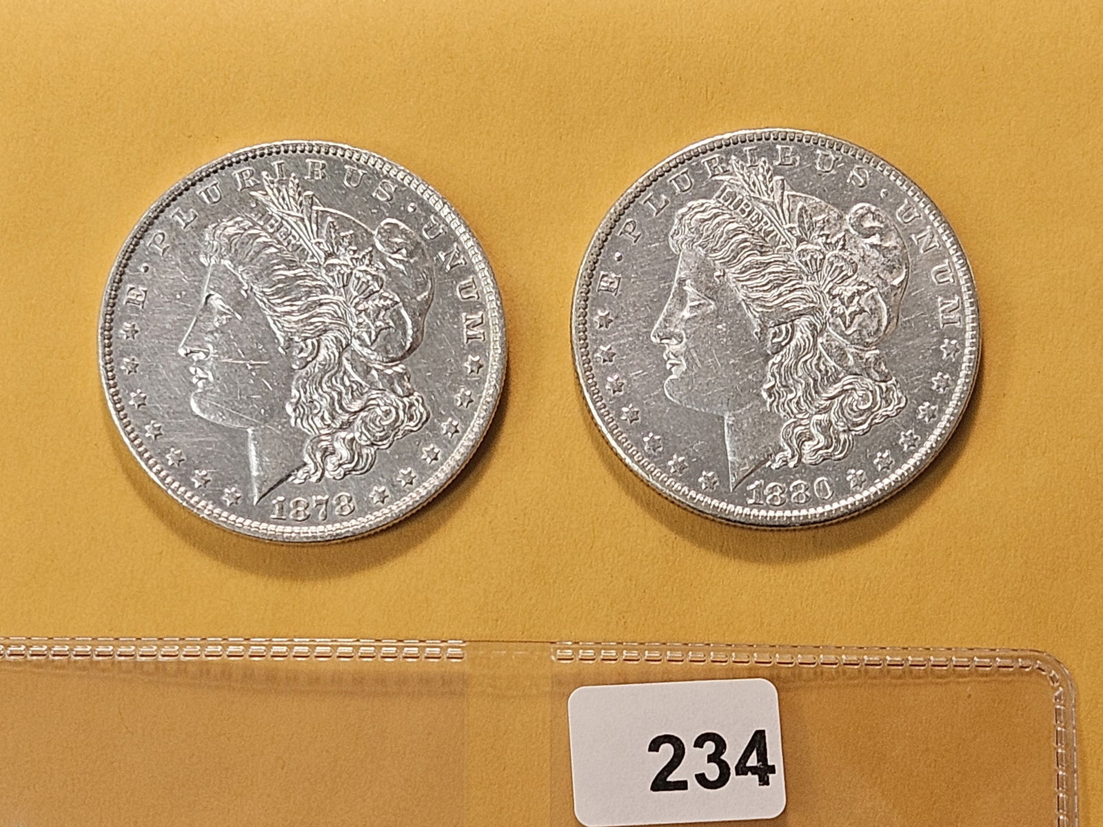 Two About Uncirculated Morgan Silver Dollars (1 of 4)