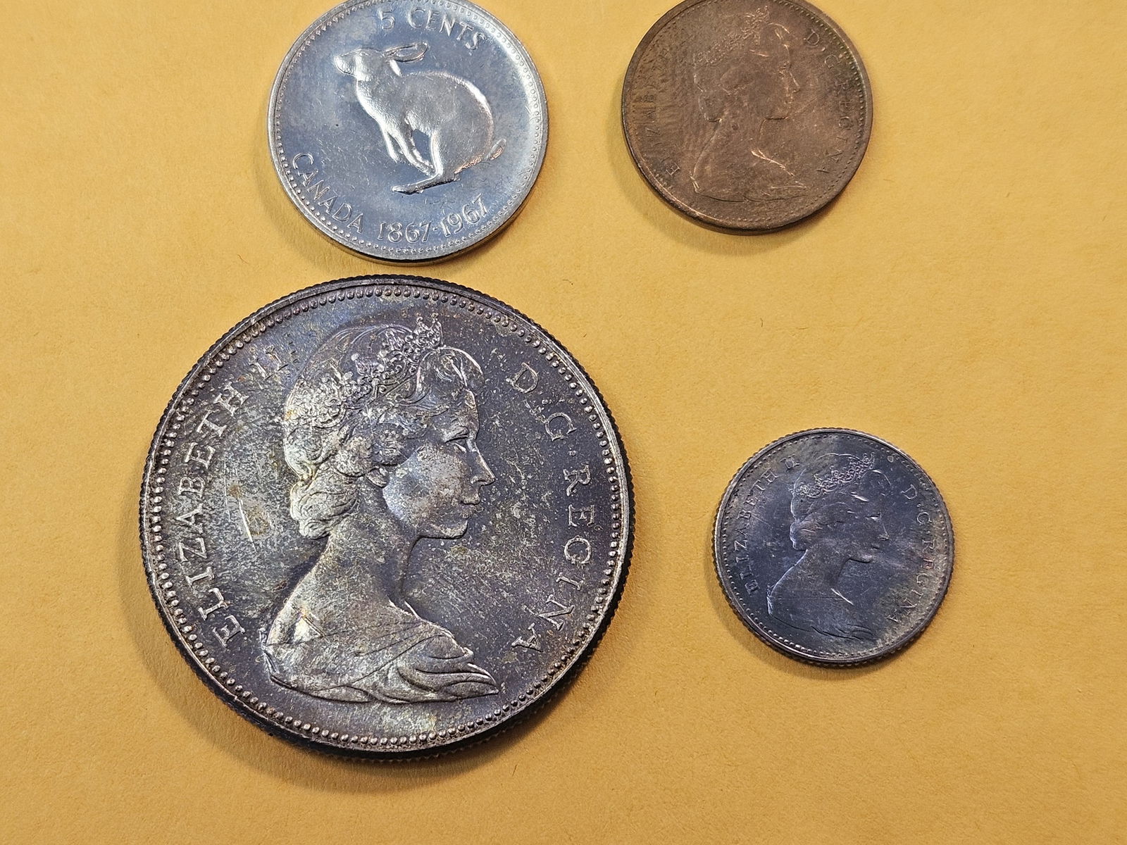 Six Foreign Coins, including 1967 Canada Silver Dollar and Dime - 6
