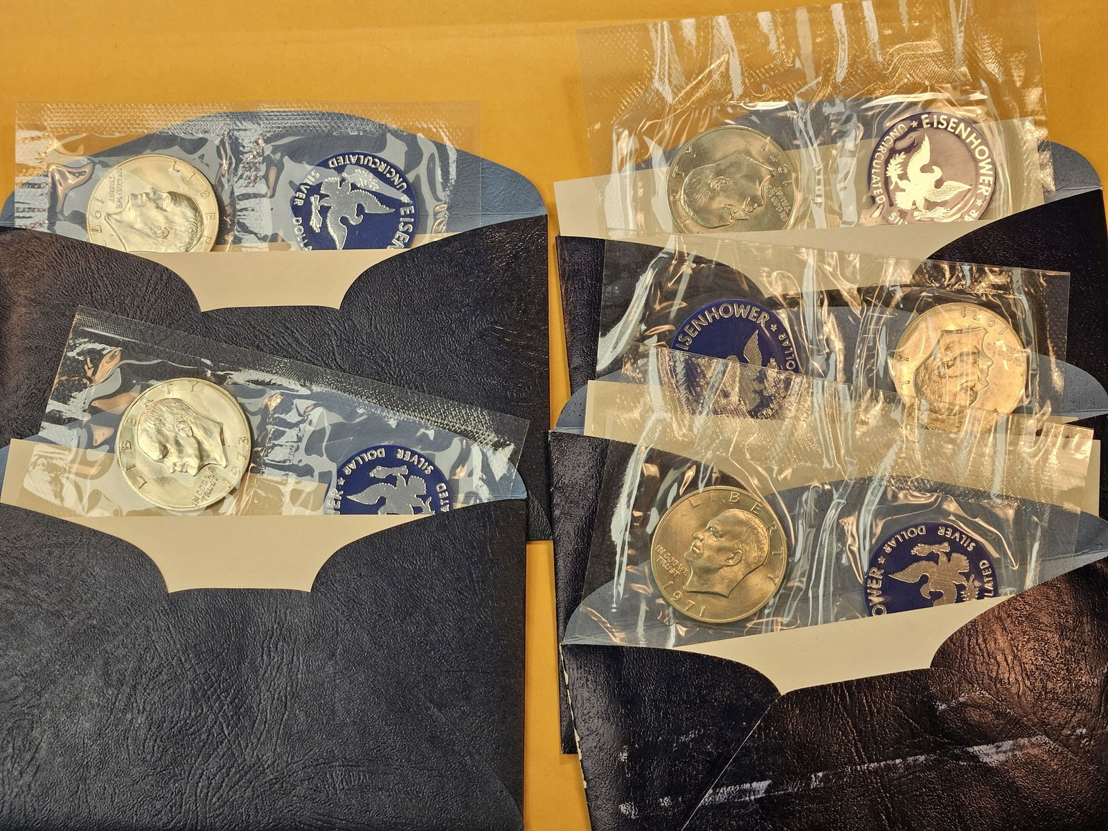 Five Blue Pack Eisenhower Silver Dollars - 2