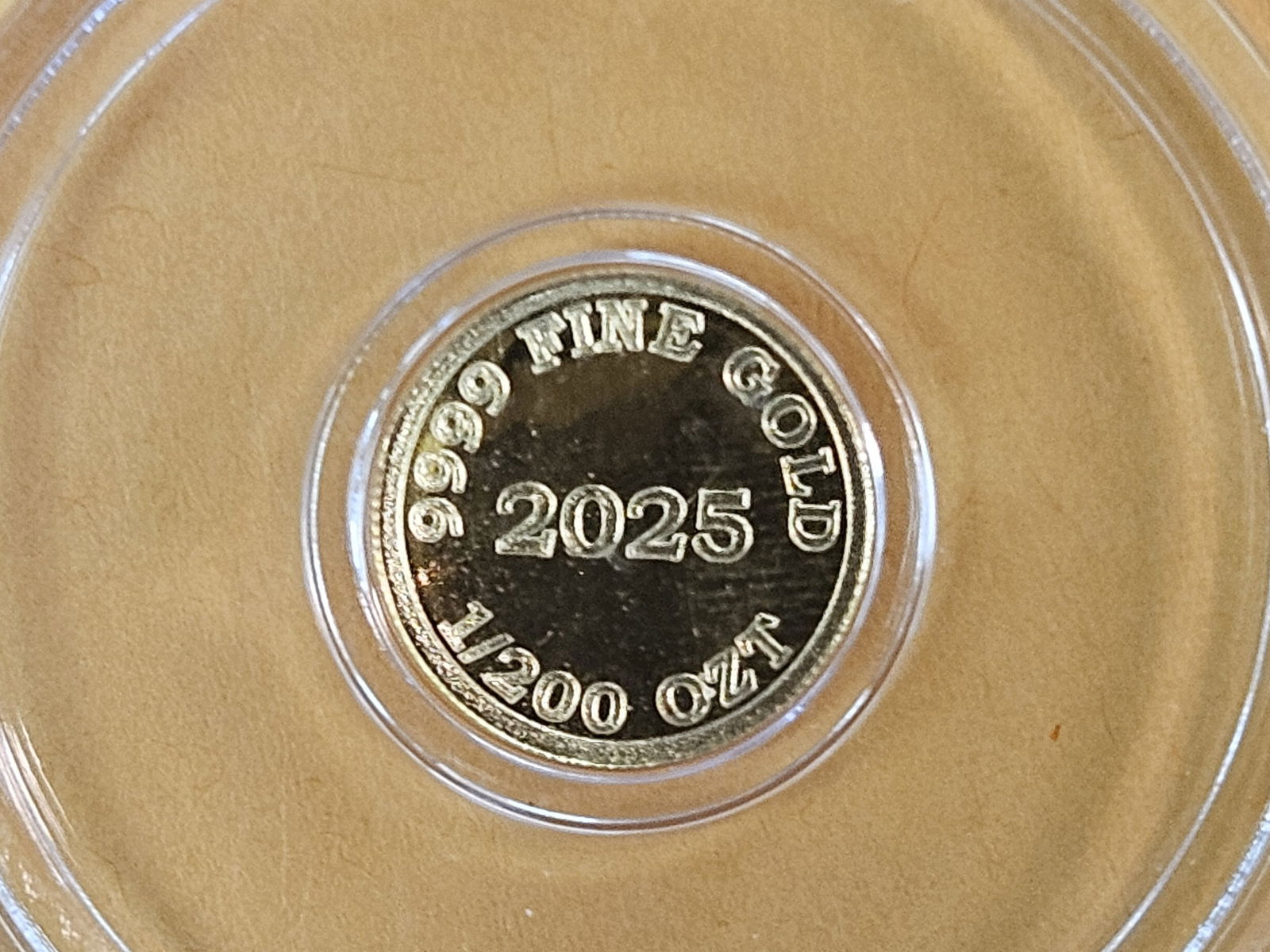 GOLD! 2025 One-two hundredth .9999 fine gold round (1 of 3)