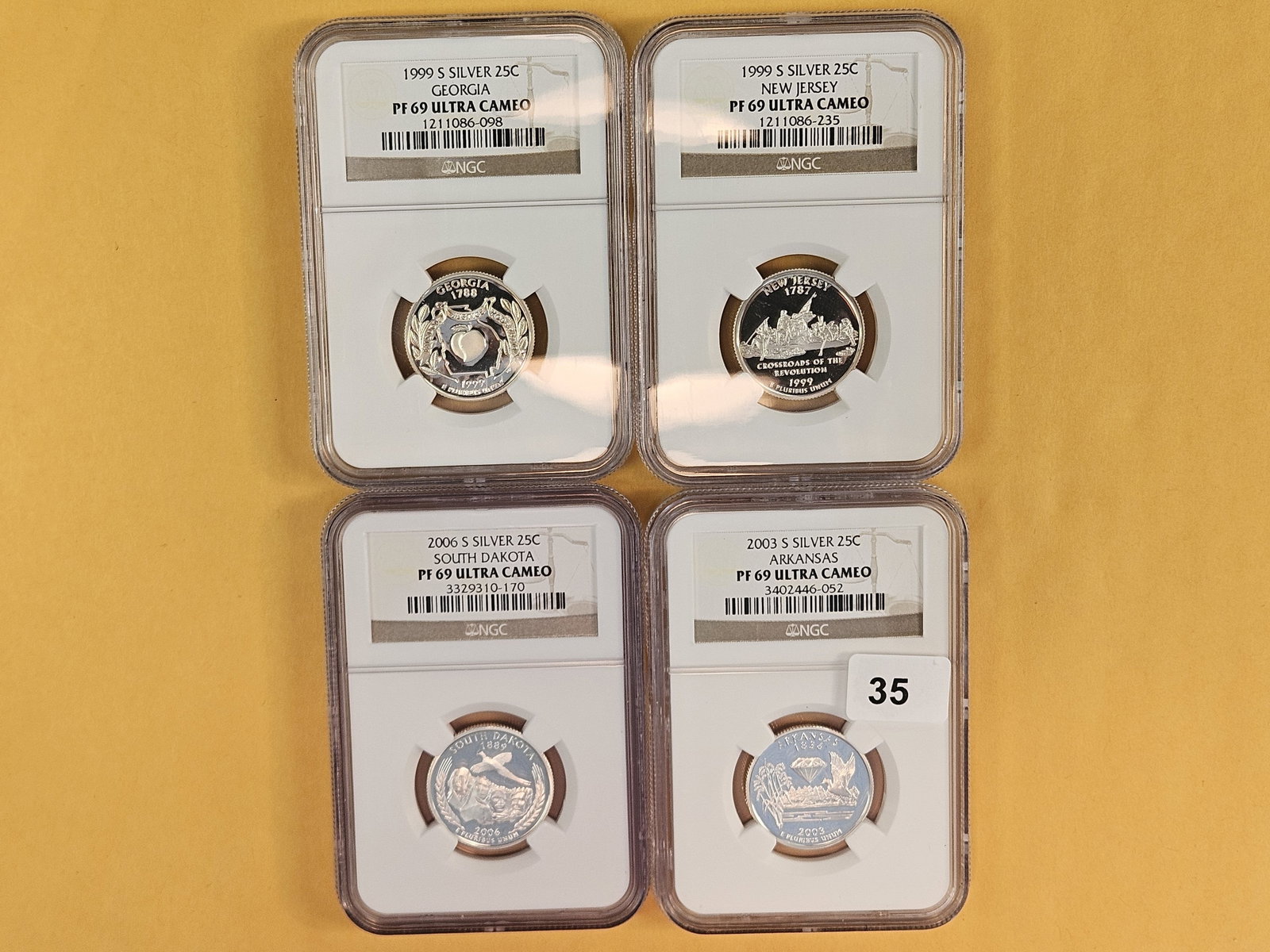 Four NGC-graded, SILVER Washington Quarters (1 of 3)