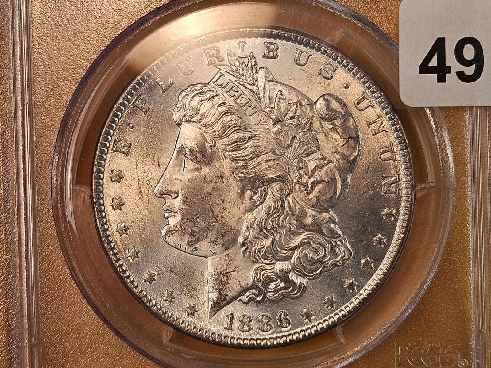 PCGS 1886 Morgan Dollar in Mint State 63 - 3