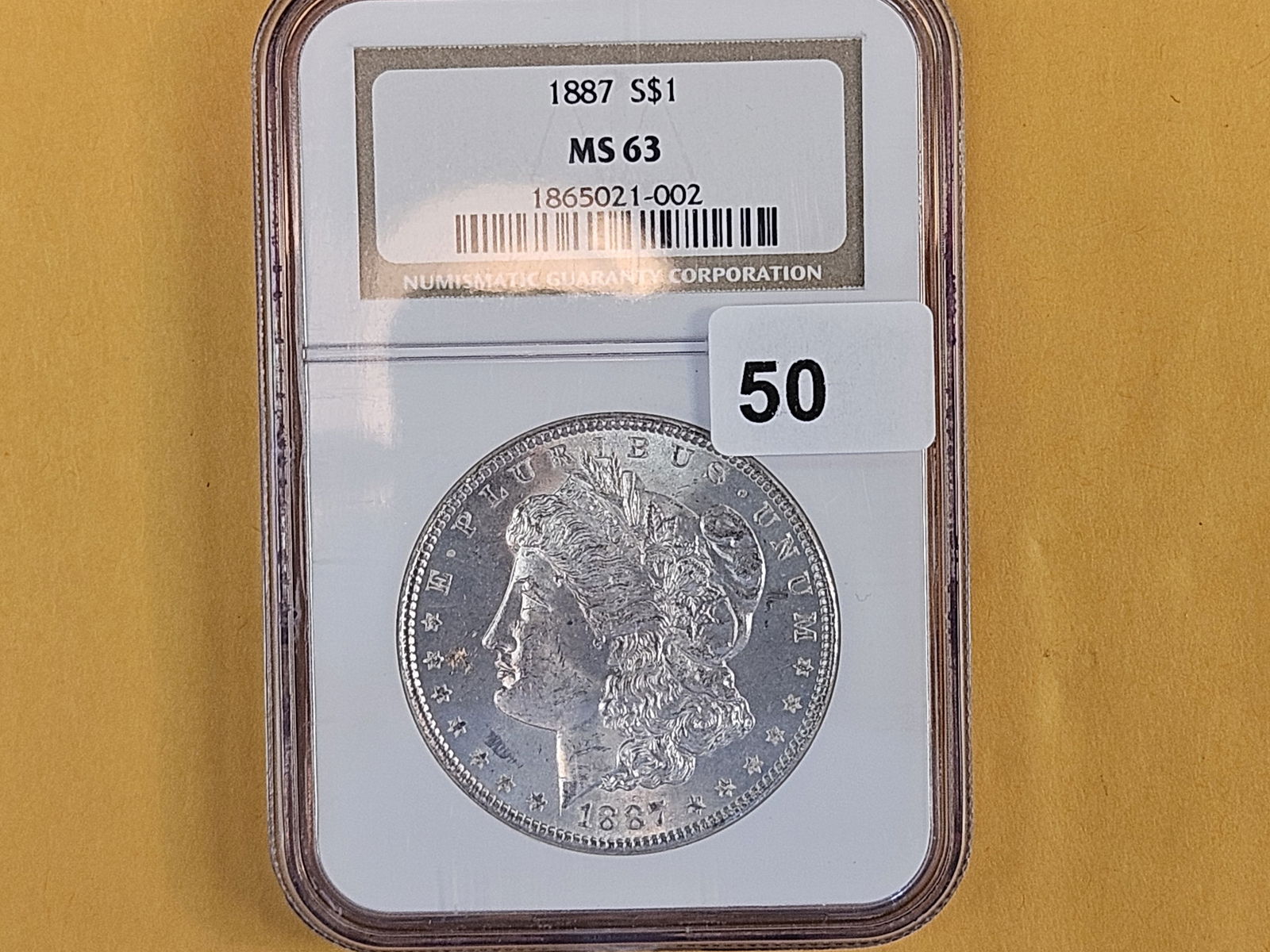 NGC 1887 Morgan Dollar in Mint State 63 - 2