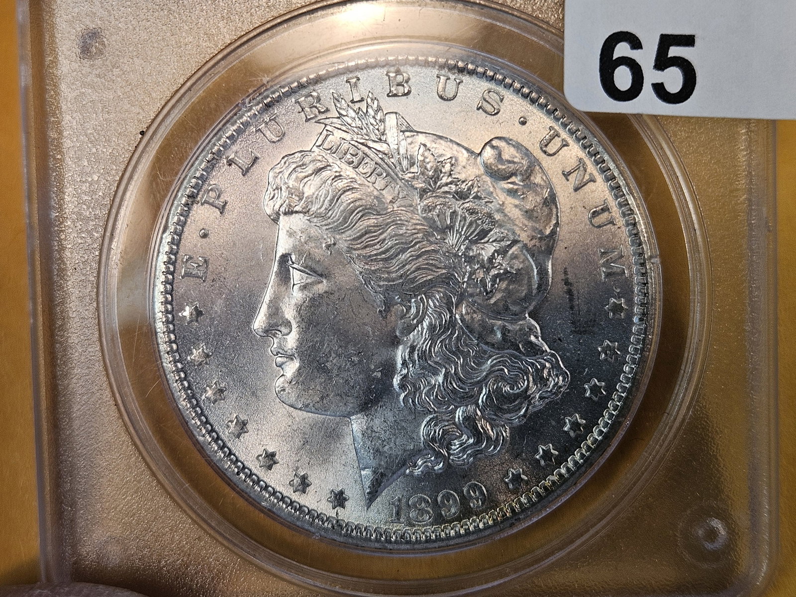 PCGS OGH 1899-O Morgan Dollar in Mint State 61: Old Green Holder 