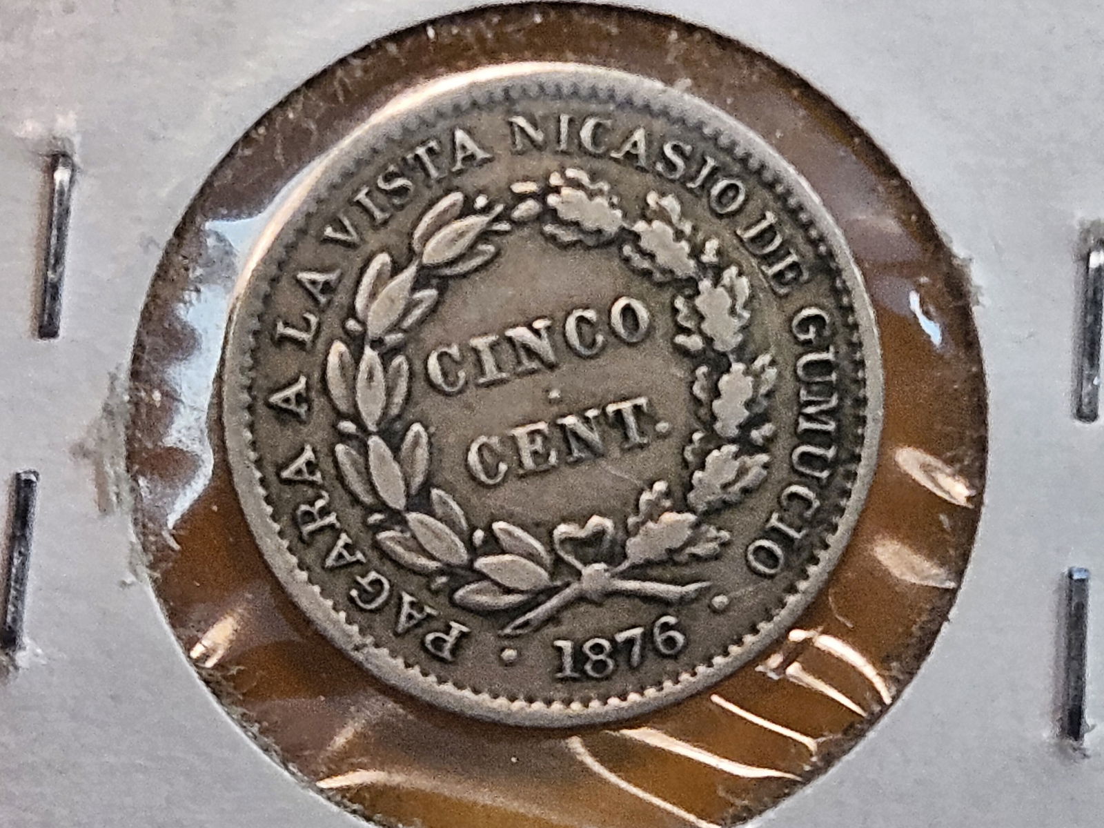 Cool 1876 Bolivia 5 cent token - 3