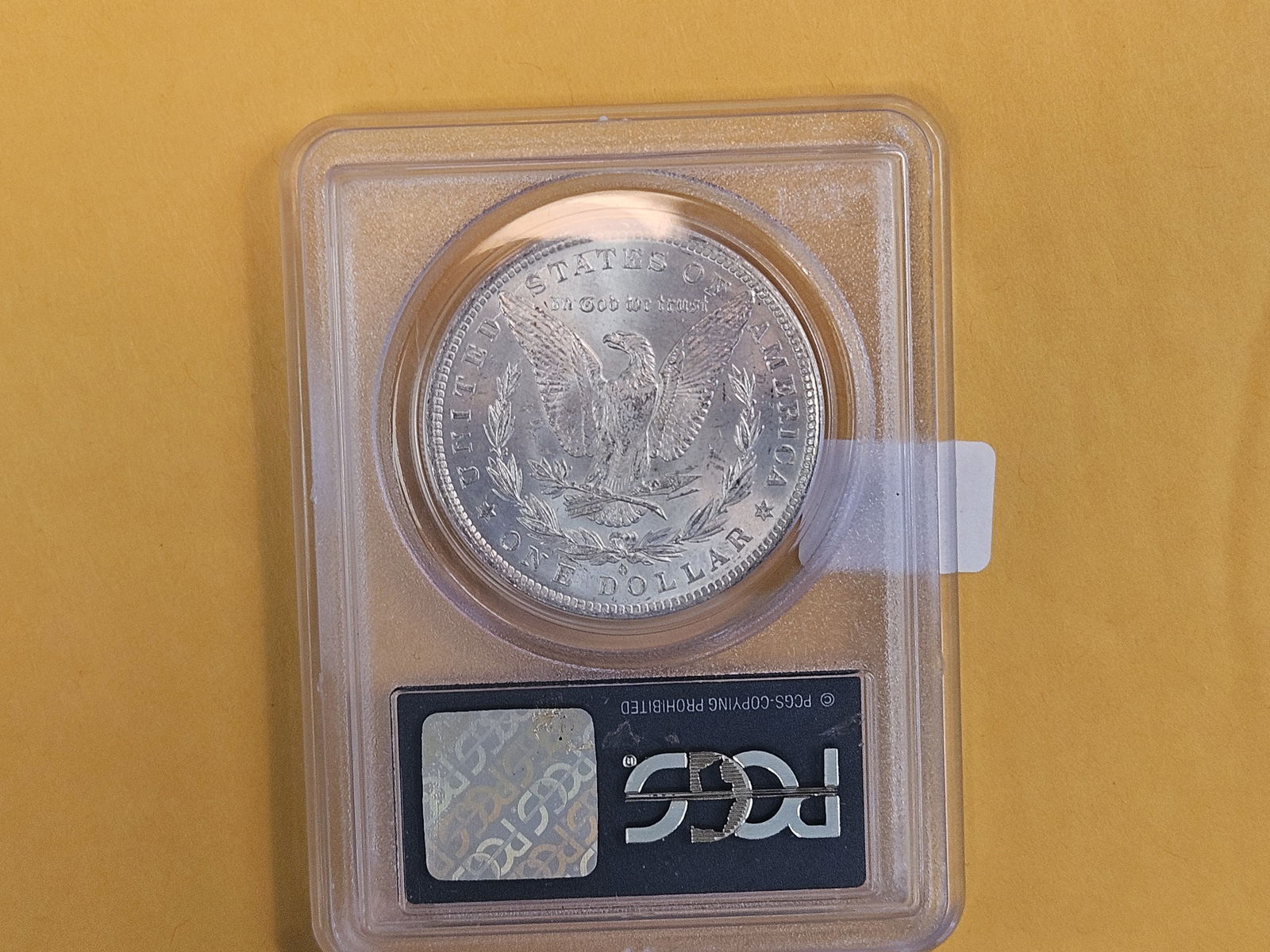 PCGS OGH 1884-O Morgan Dollar in Mint State 63 - 3