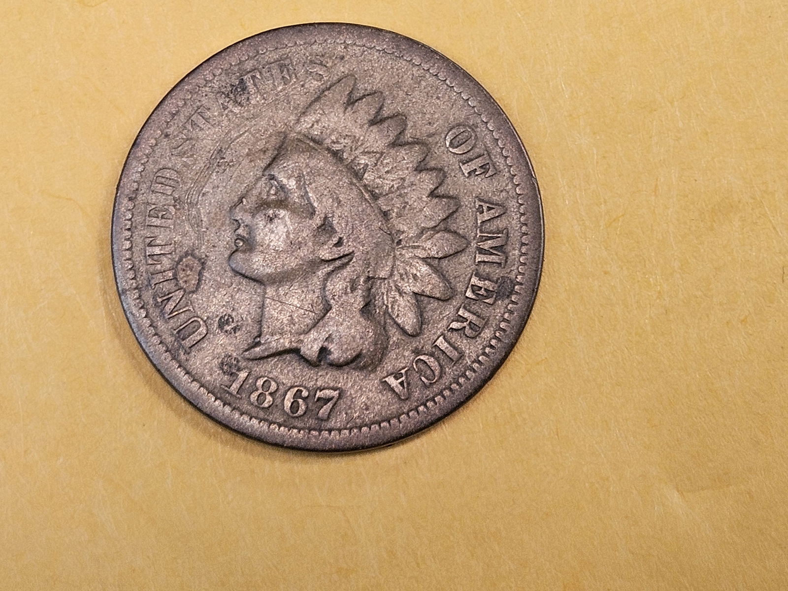 Semi-Key 1867 Indian cent: In Very Good 