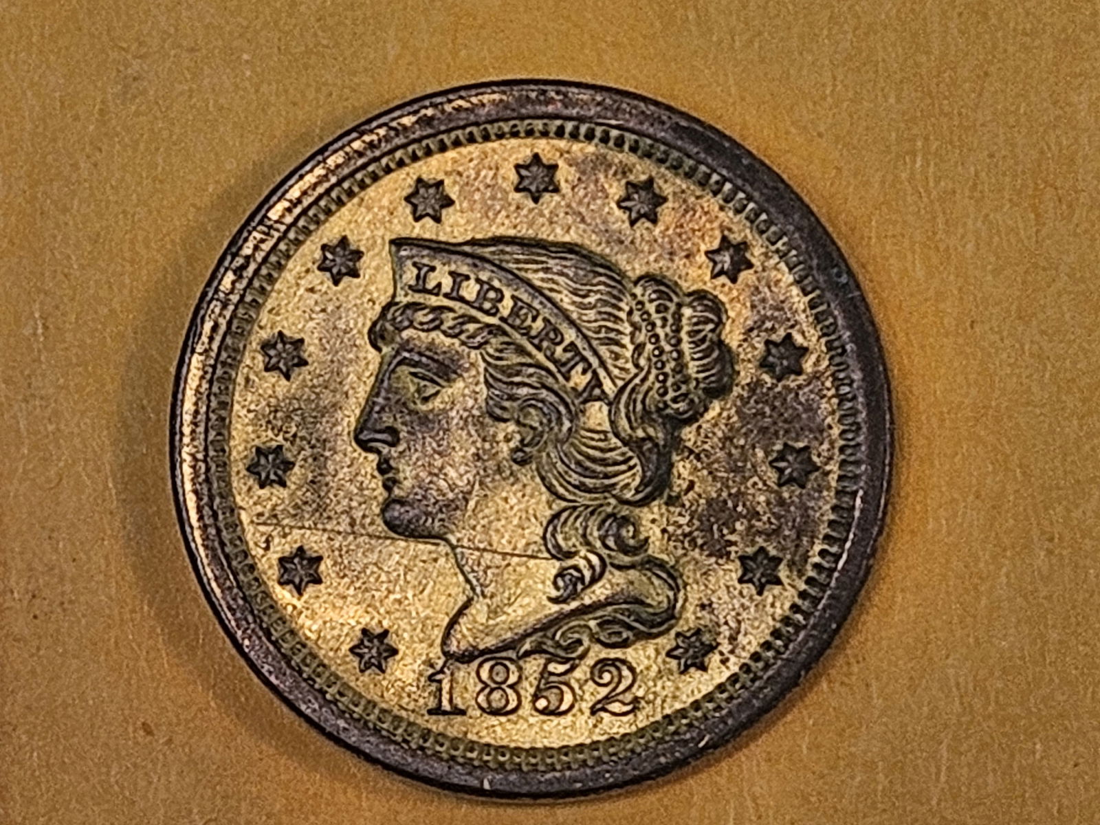 1852 Braided Hair Large cent in About Uncirculated plus - details: Not sure if someone tried to plate it or what