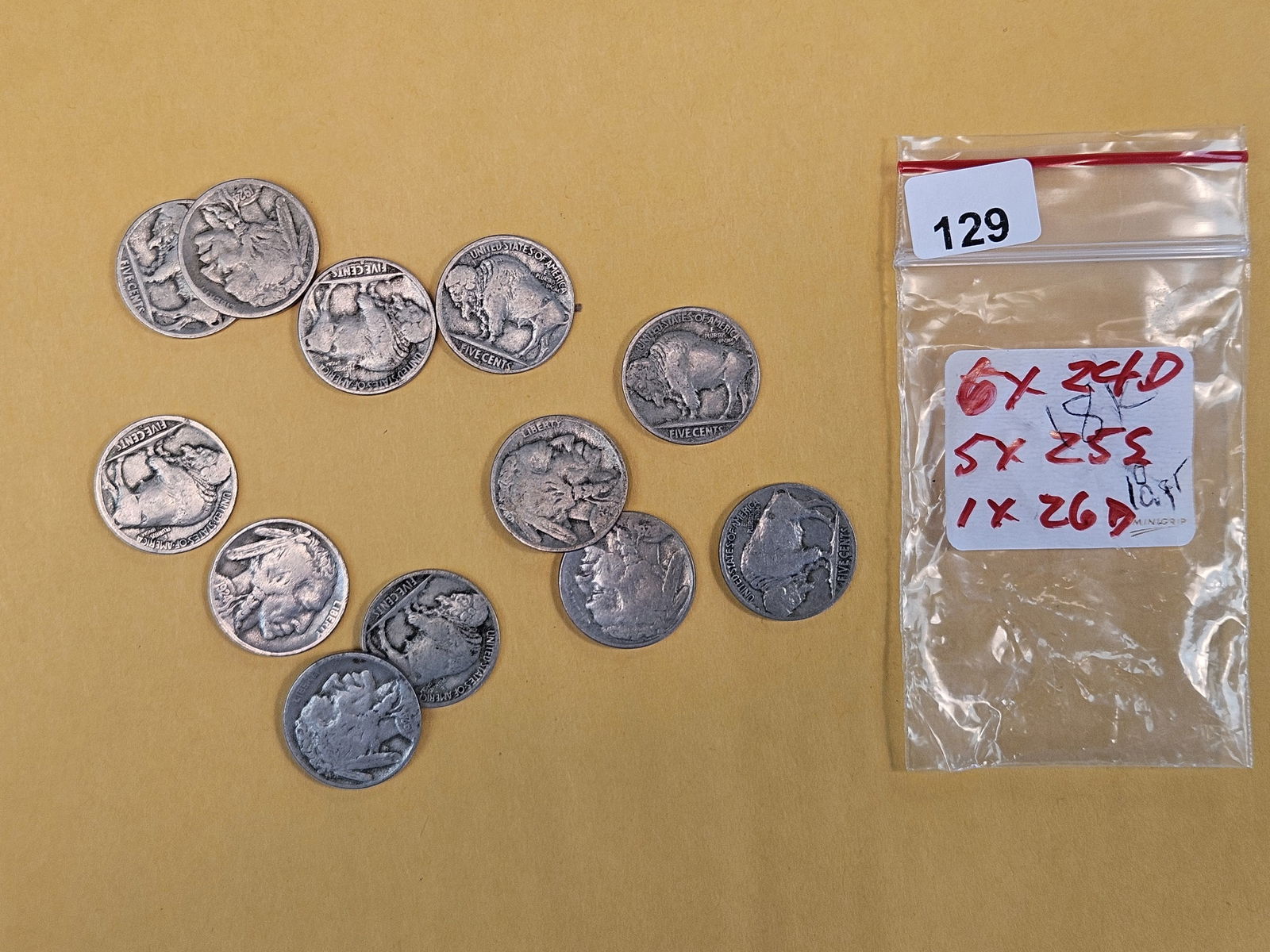 Twelve better date Buffalo Nickels: 24-D, 25-S and 26-D 