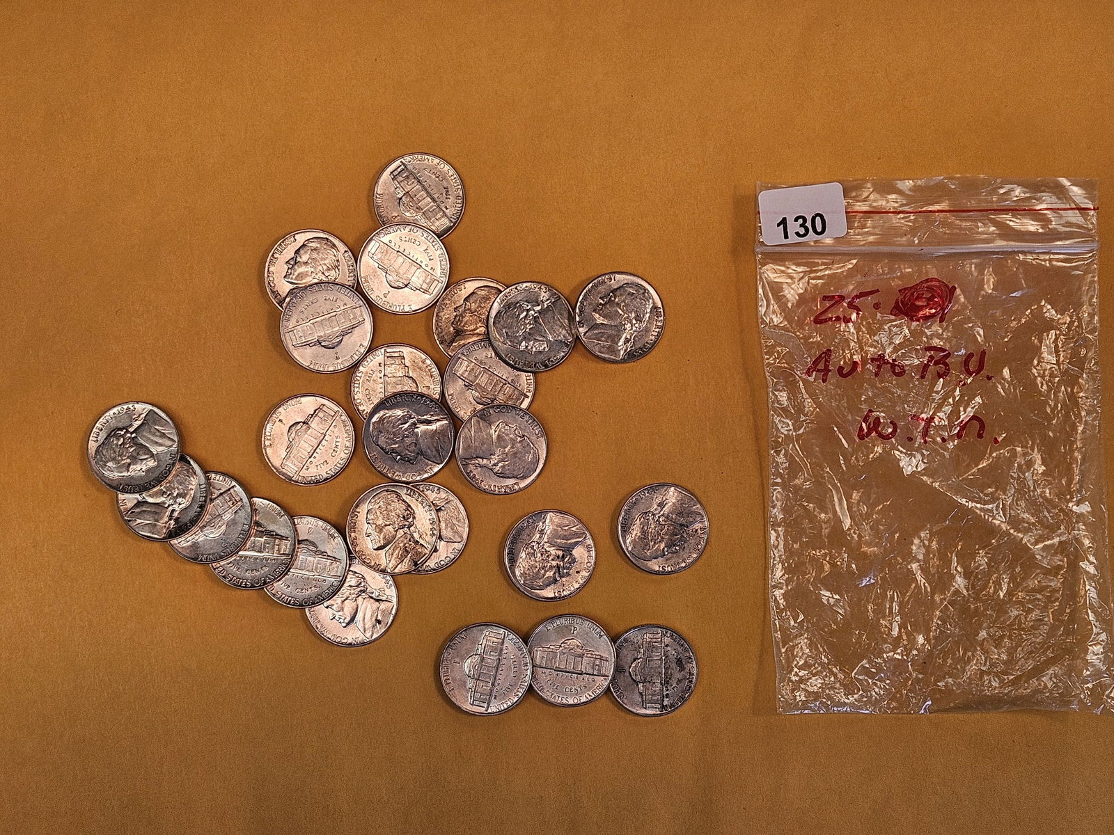 Twenty-five Brilliant, mixed, SILVER Wartime Jefferson Nickels: All silvers. All AU to BU