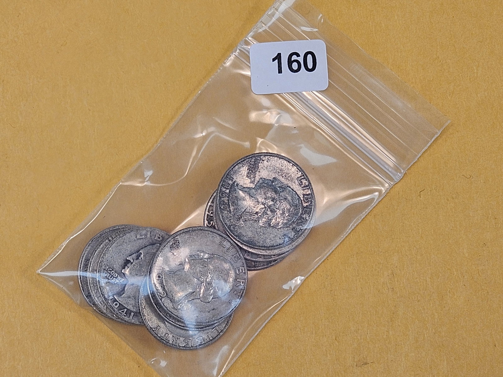 Ten mixed silver Washington Quarters: All circulated 