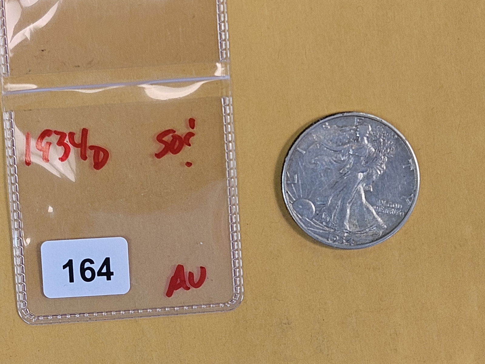 About Uncirculated 1934-D Walking Liberty Half Dollar - 2