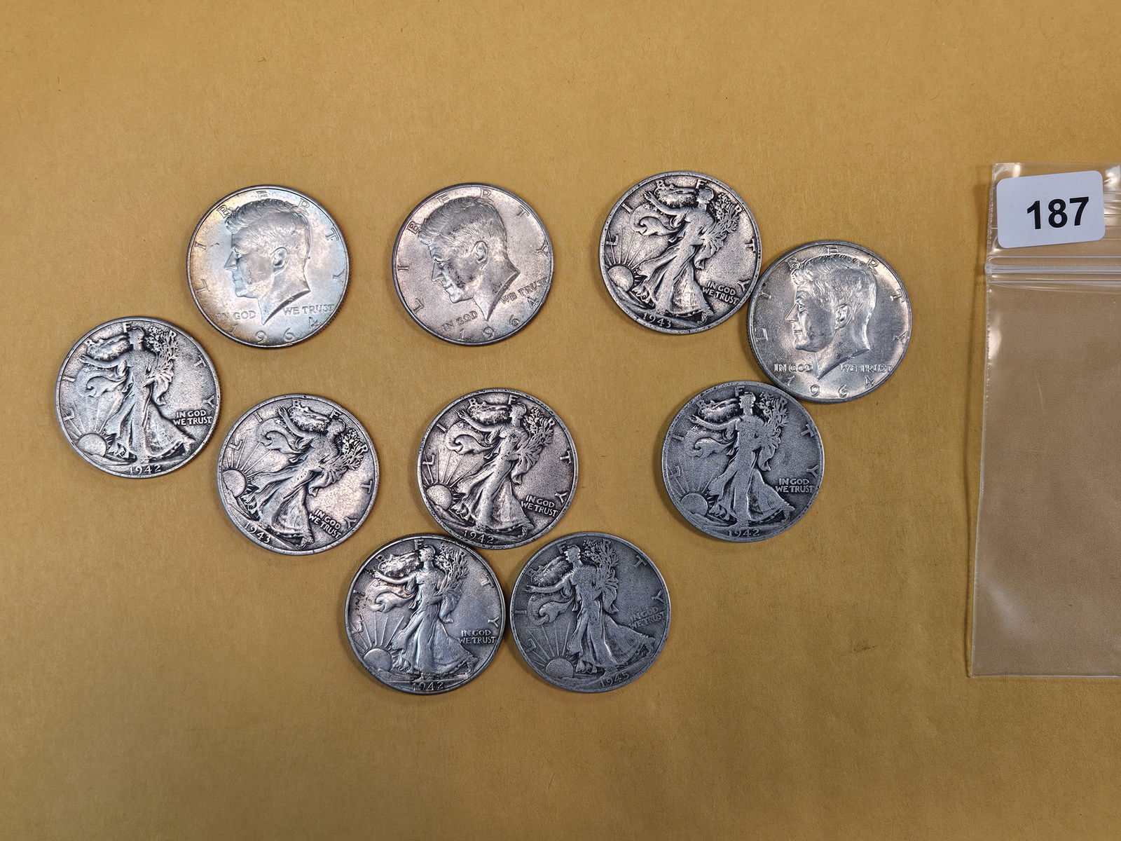 Ten mixed silver Half Dollars: Kennedy and Walkers 