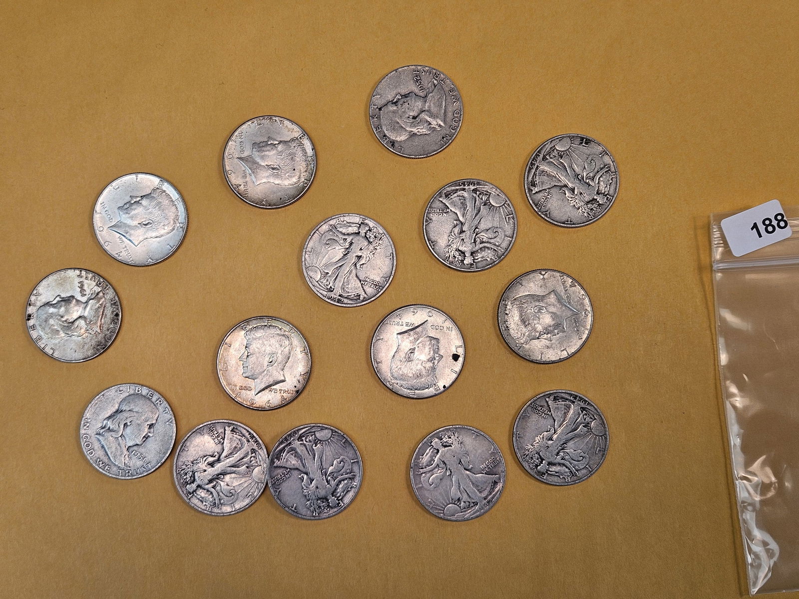 Fifteen mixed silver Half Dollars: Kennedy, Franklin and Walkers 