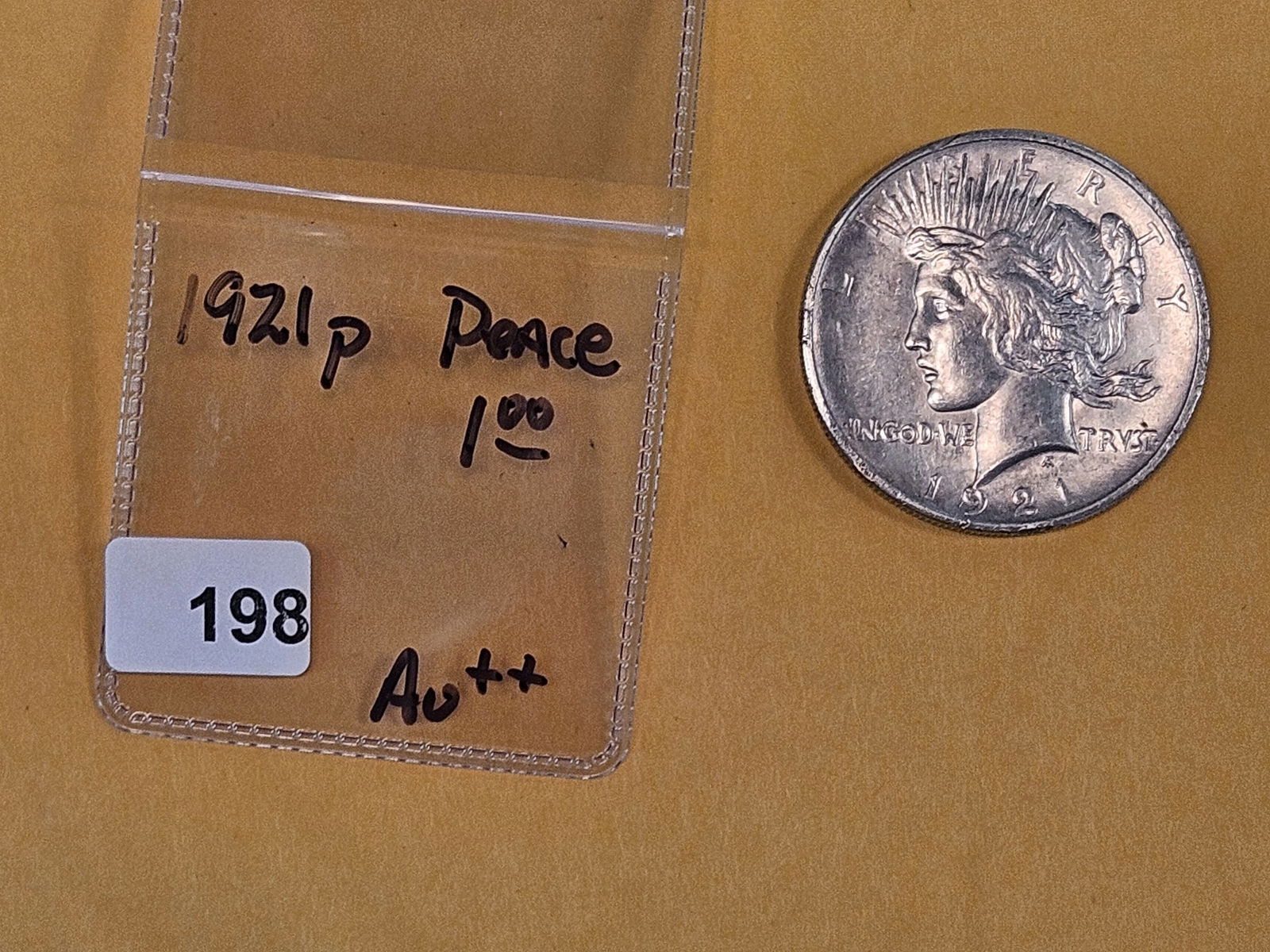 ** KEY DATE ** 1921 Peace silver Dollar in Brilliant About Uncirculated plus - 2