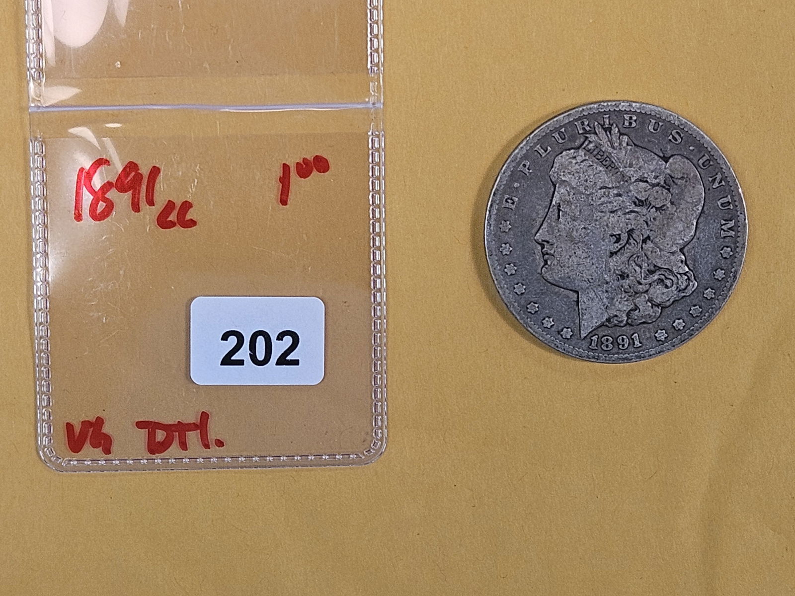 ** KEY DATE ** 1891-CC Morgan Dollar in Very Good - details - 2