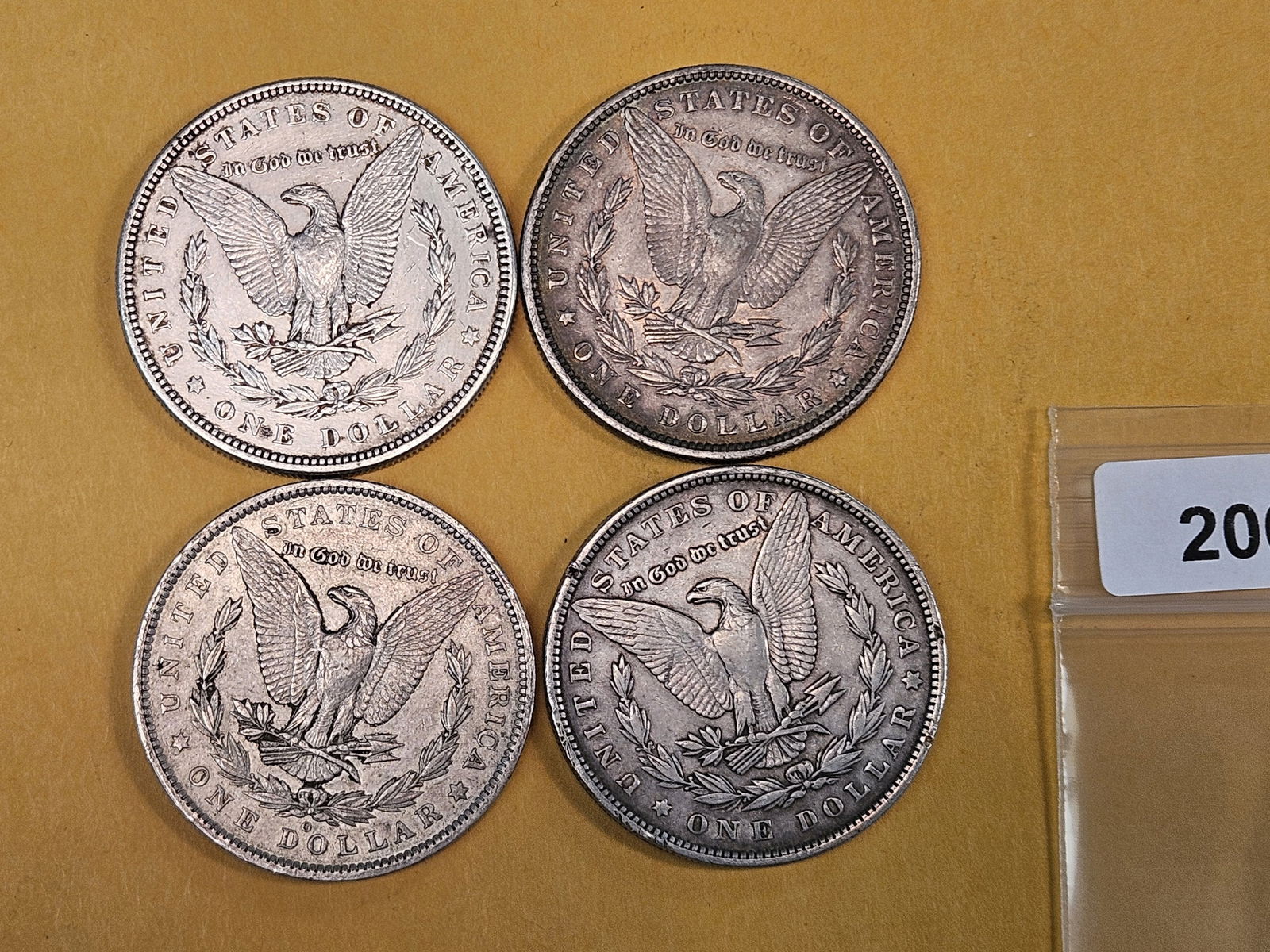 Four mixed Morgan silver Dollars - 2