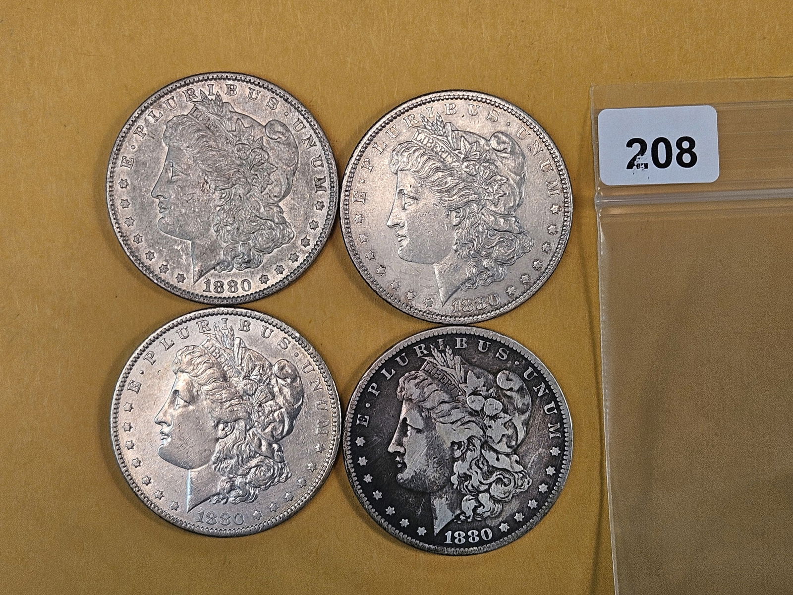 Four mixed Morgan silver Dollars: Circulated 