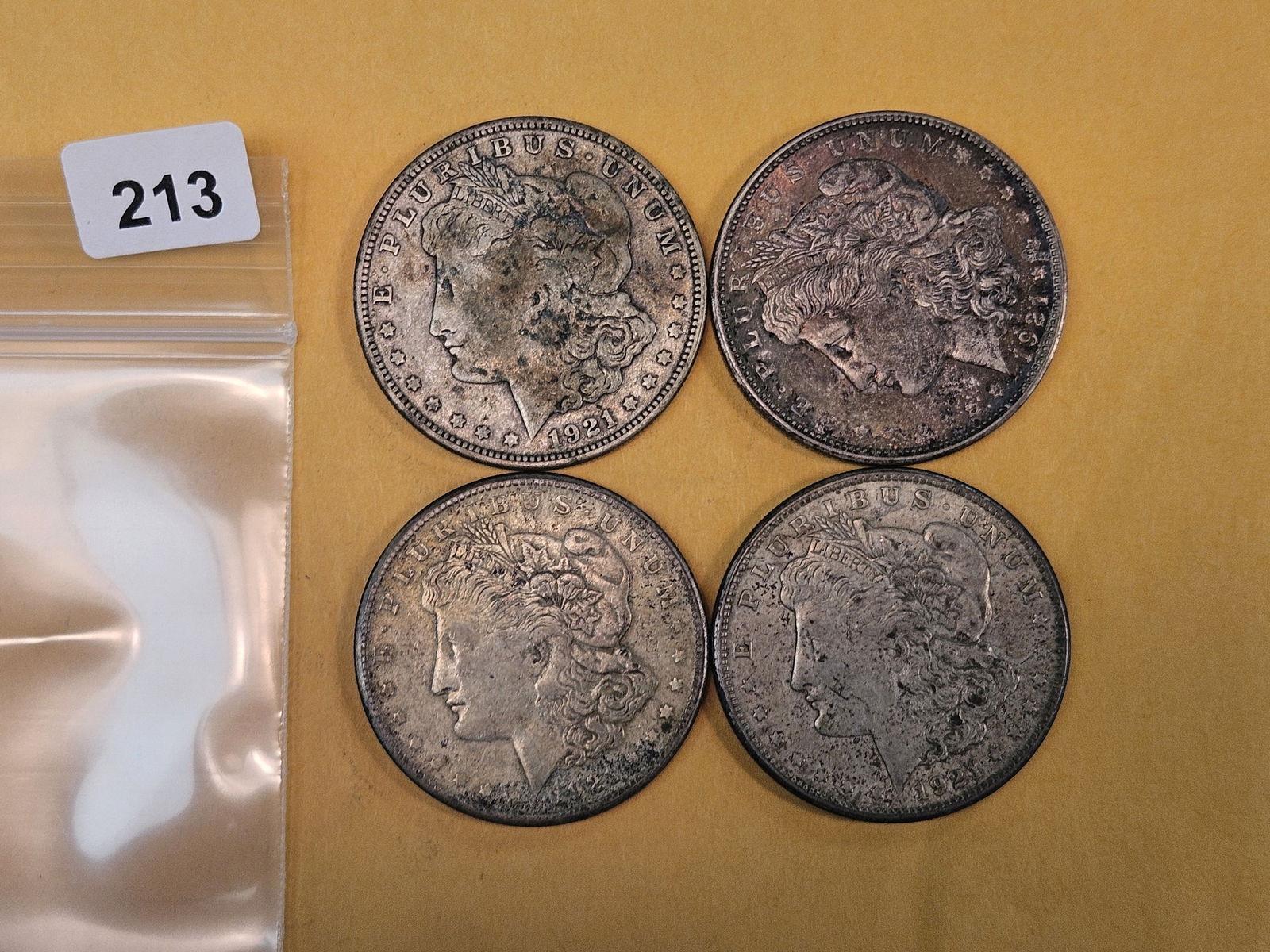 Four 1921 Morgan silver Dollars (1 of 2)