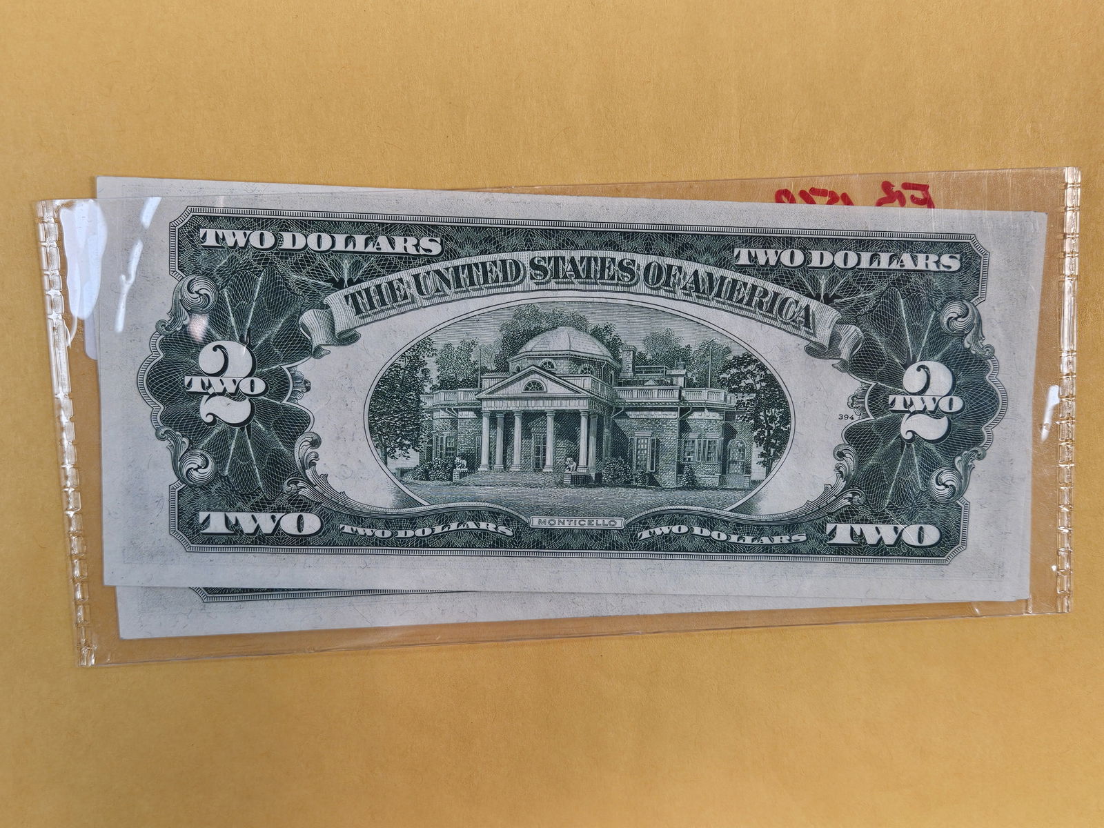 Two Crisp Uncirculated Two Dollar RED Seal US Notes - 2