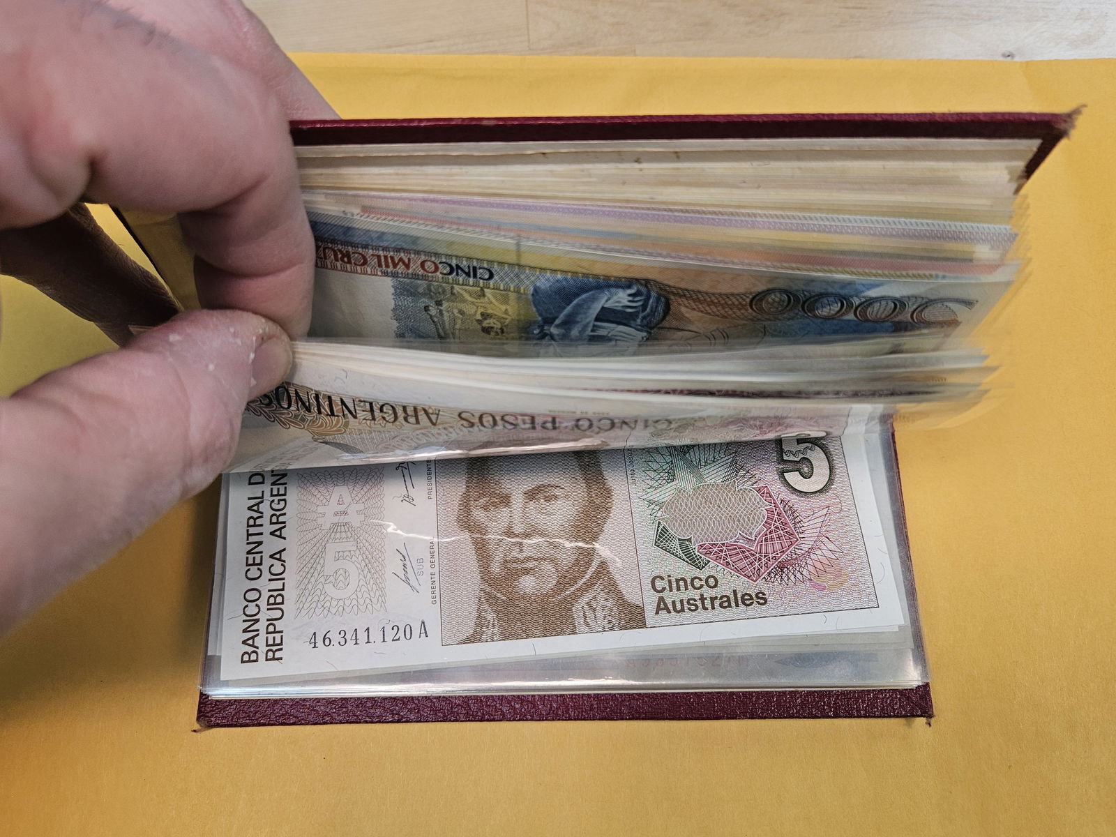 Full little booklet of mixed World currency - 11