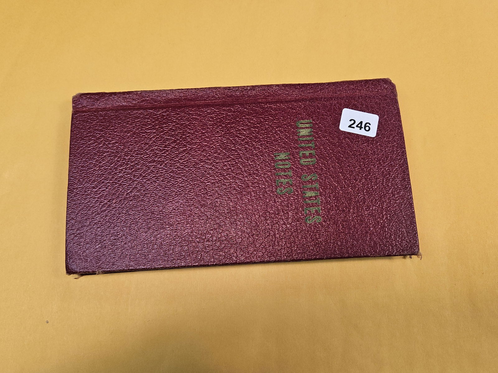 Full little booklet of mixed World currency: Many crisp uncirculated 