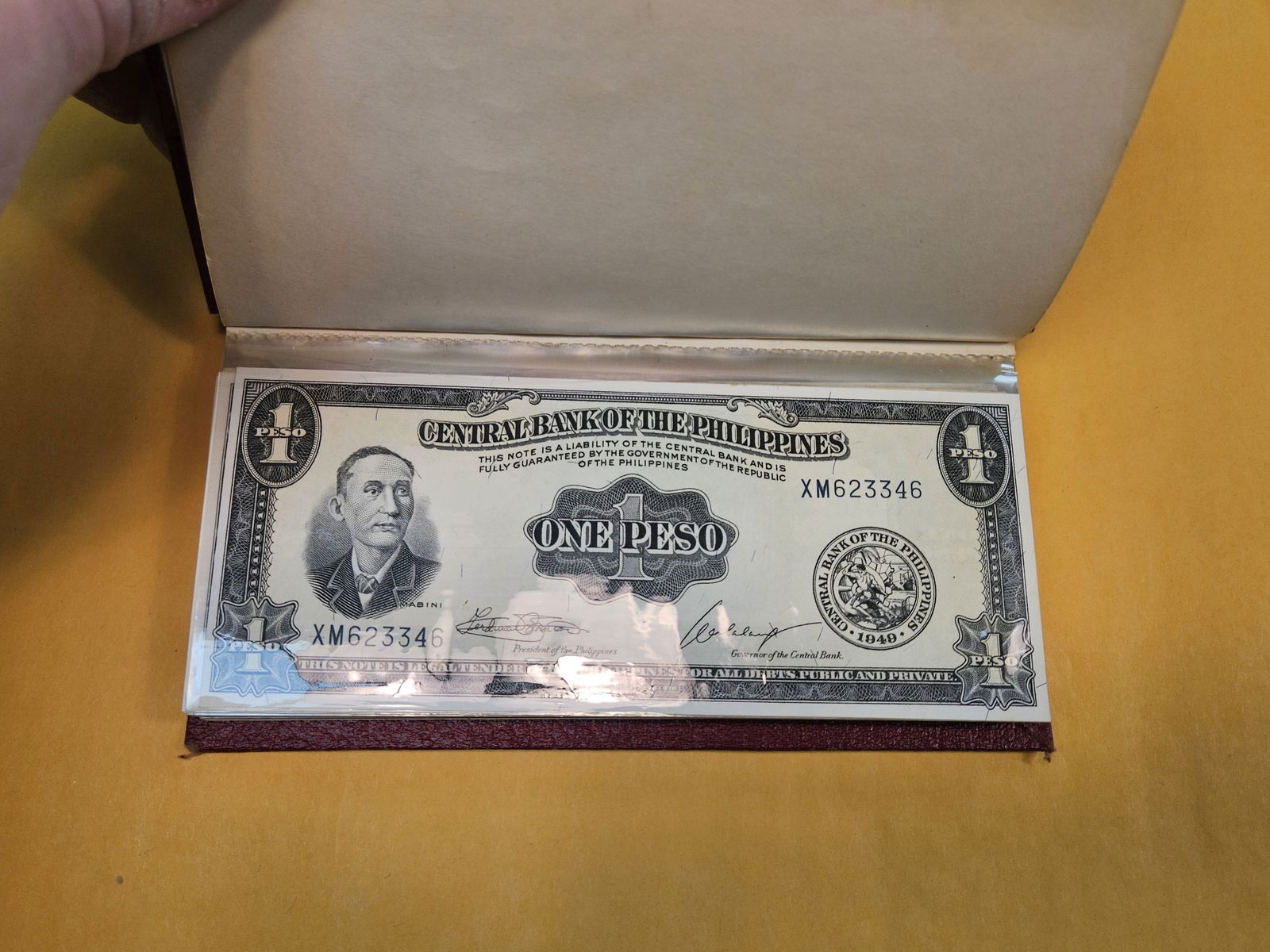 Full little booklet of mixed World currency - 2