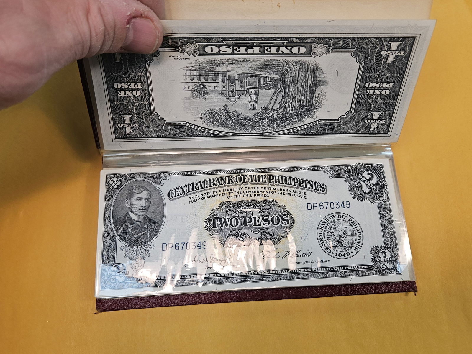 Full little booklet of mixed World currency - 3