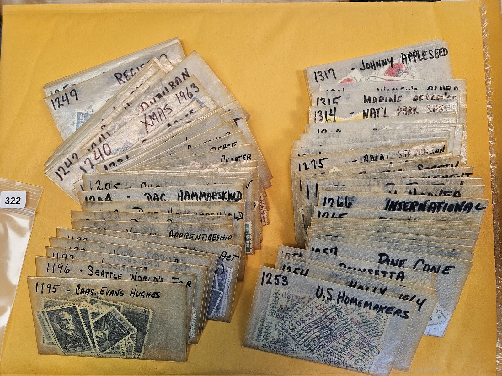 PHILATELICS!: About 50 wax envelopes with mixed Stamps. I think they're all cancelled, but we didn't check 