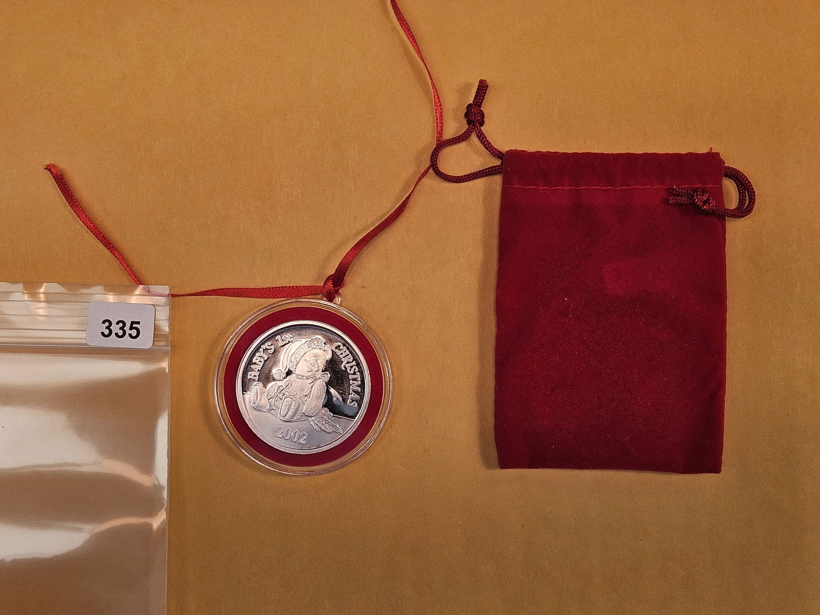 One Troy ounce .999 fine silver proof art round: Baby's first Christmas 2002 