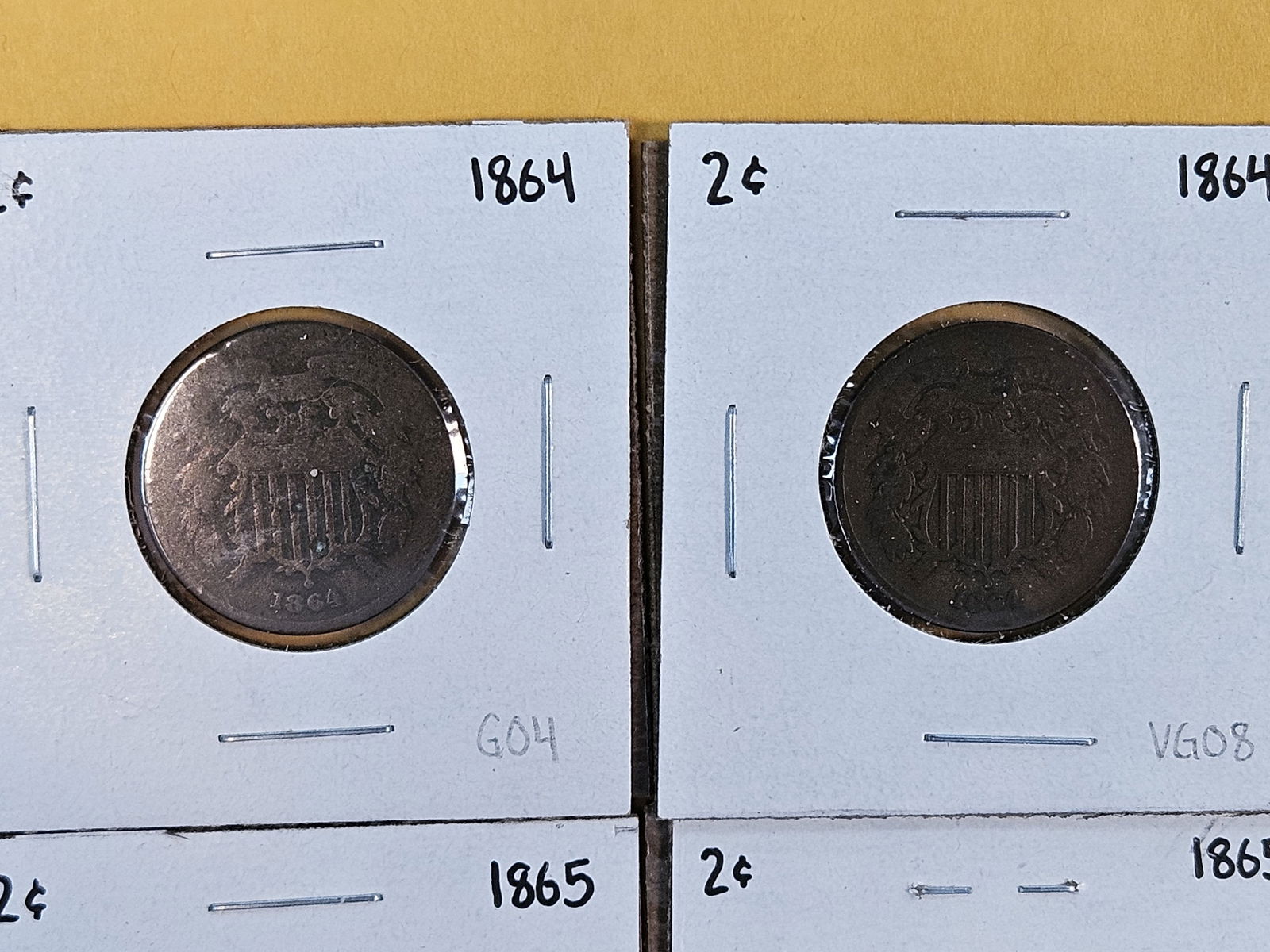 Four more mixed 2-cent pieces - 2