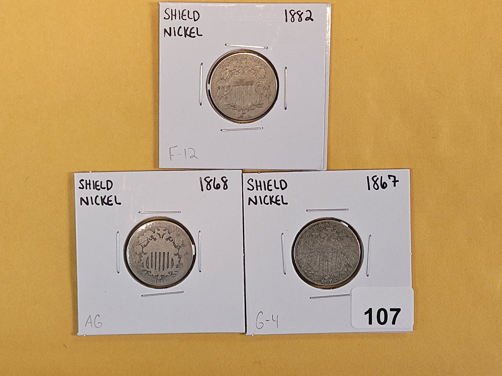 Three mixed Shield Nickels: 1882, 1868 and 1867 