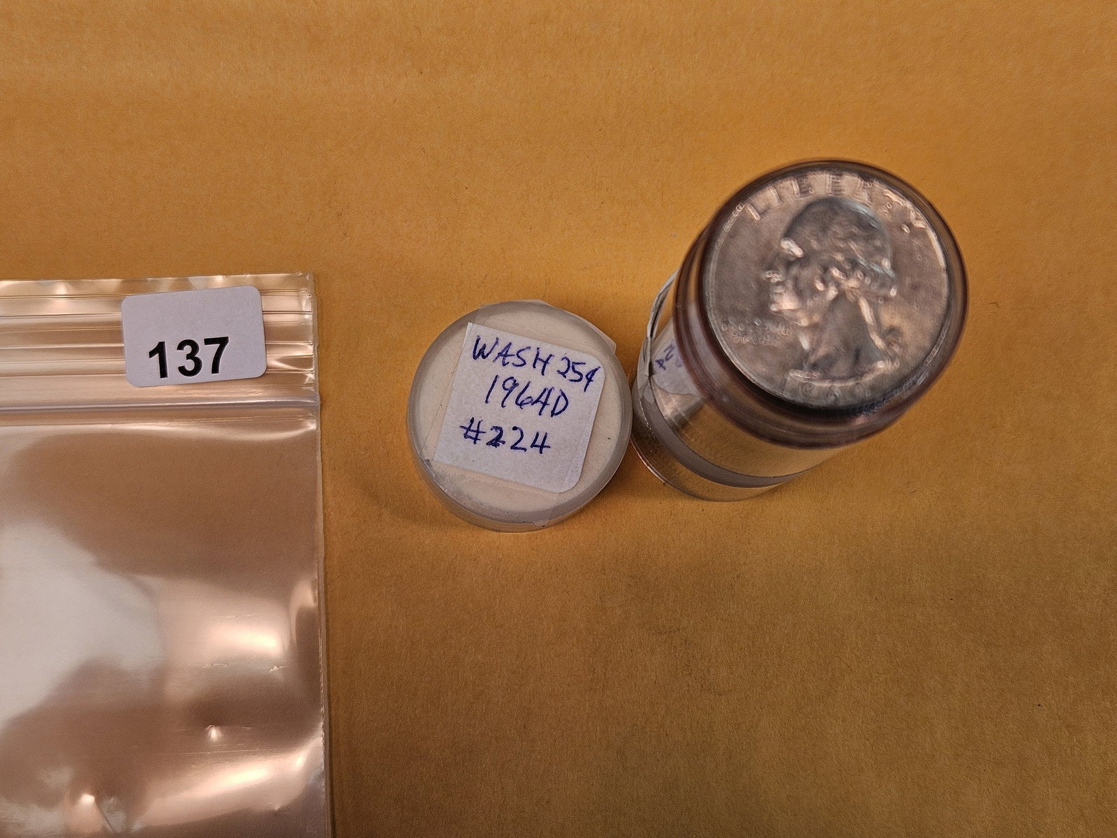 Full roll of 1964-D silver Washington Quarters: Circulated. From consignor. Unchecked by us 