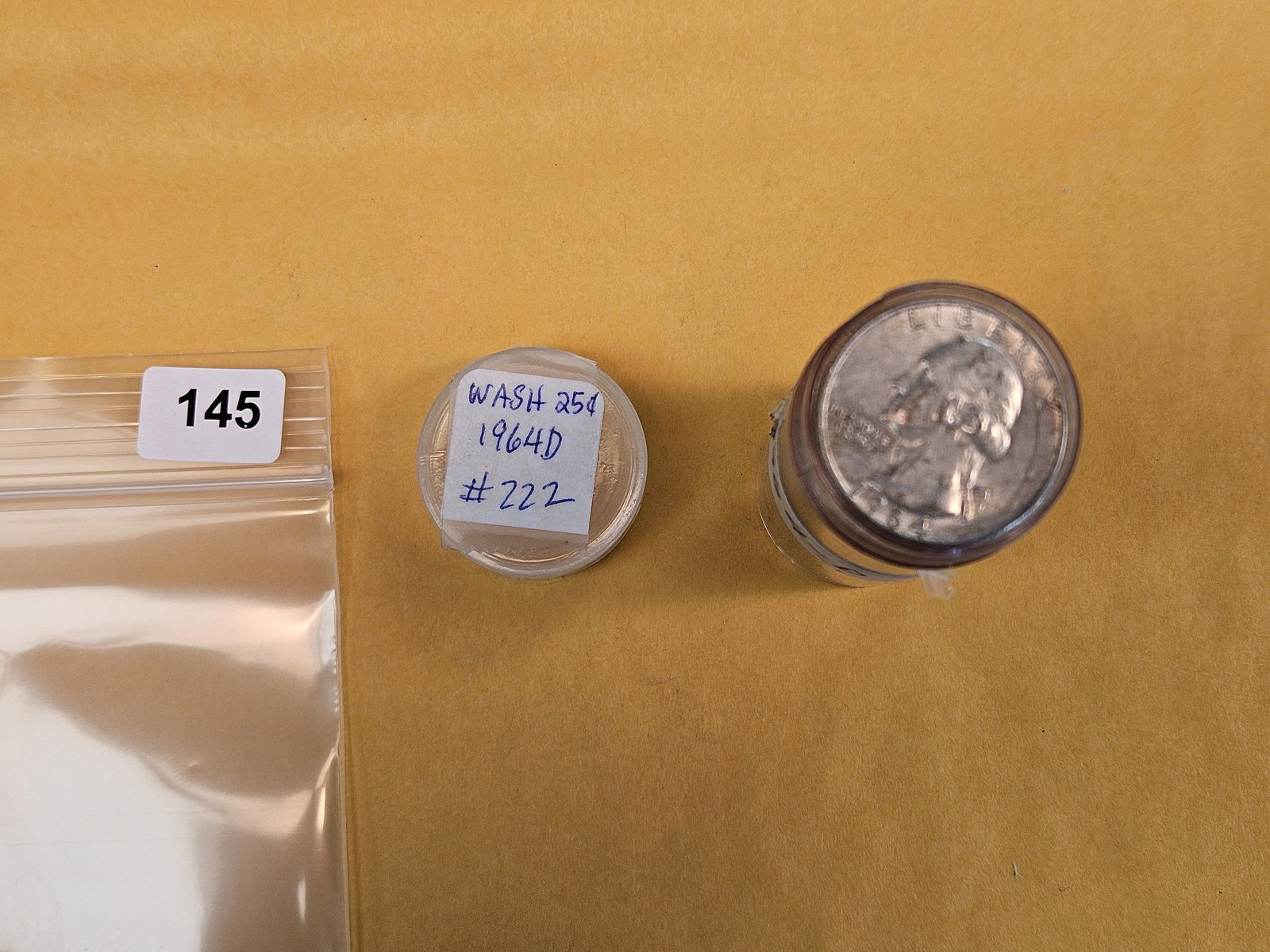 Full roll of 1964-D silver Washington Quarters: Circulated. From consignor. Unchecked by us 
