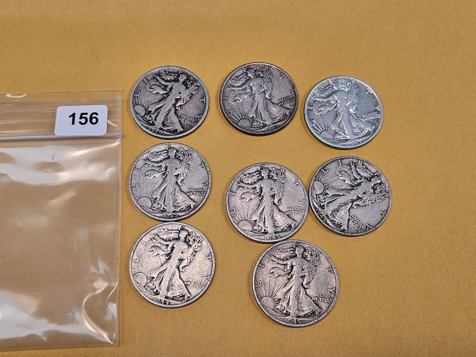 Eight mixed silver Walking Liberty Half Dollars - 2