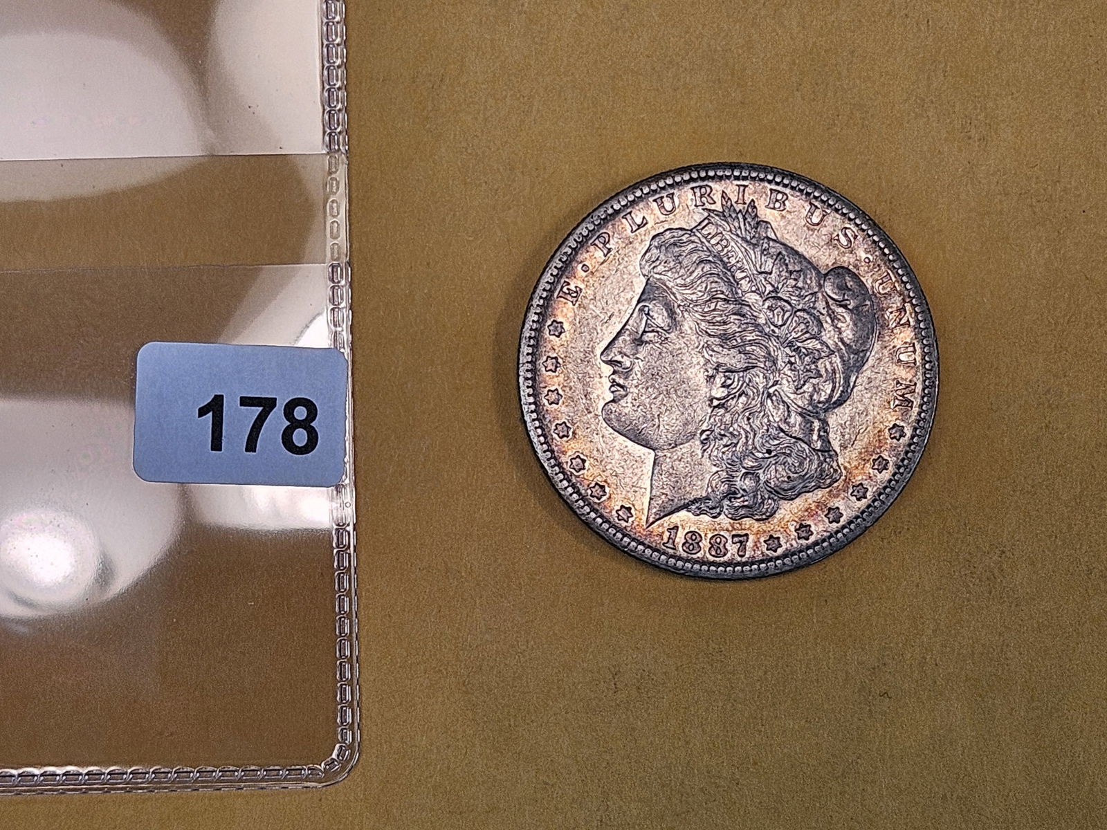 Better 1887-S Morgan Dollar in About Uncirculated - 2