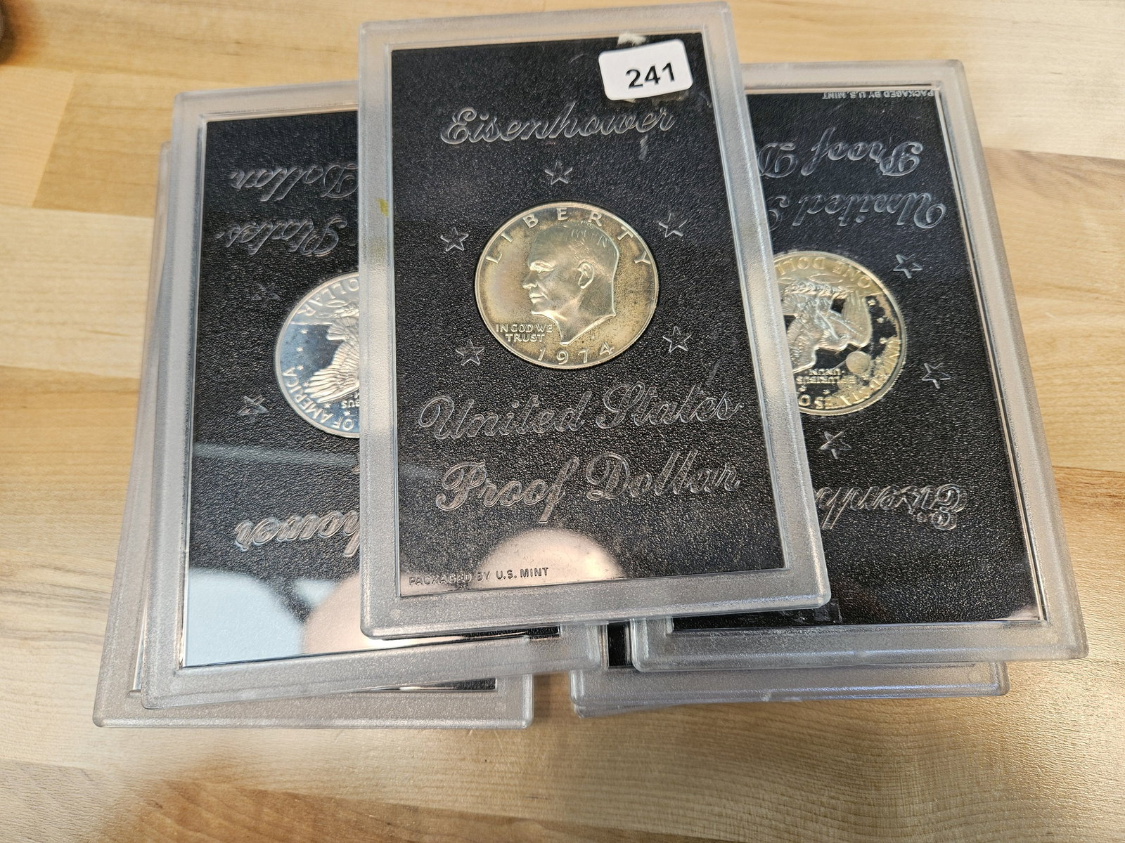 Seven Silver Proof Brown IKE Silver Dollars (1 of 2)