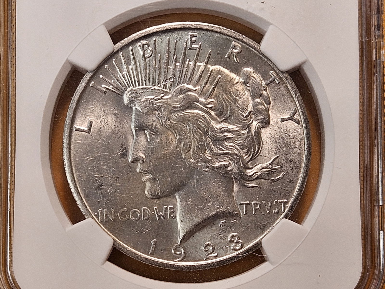 NGC 1923-S Peace Silver Dollar in Mint State 61: Brilliant Cartwheel! 