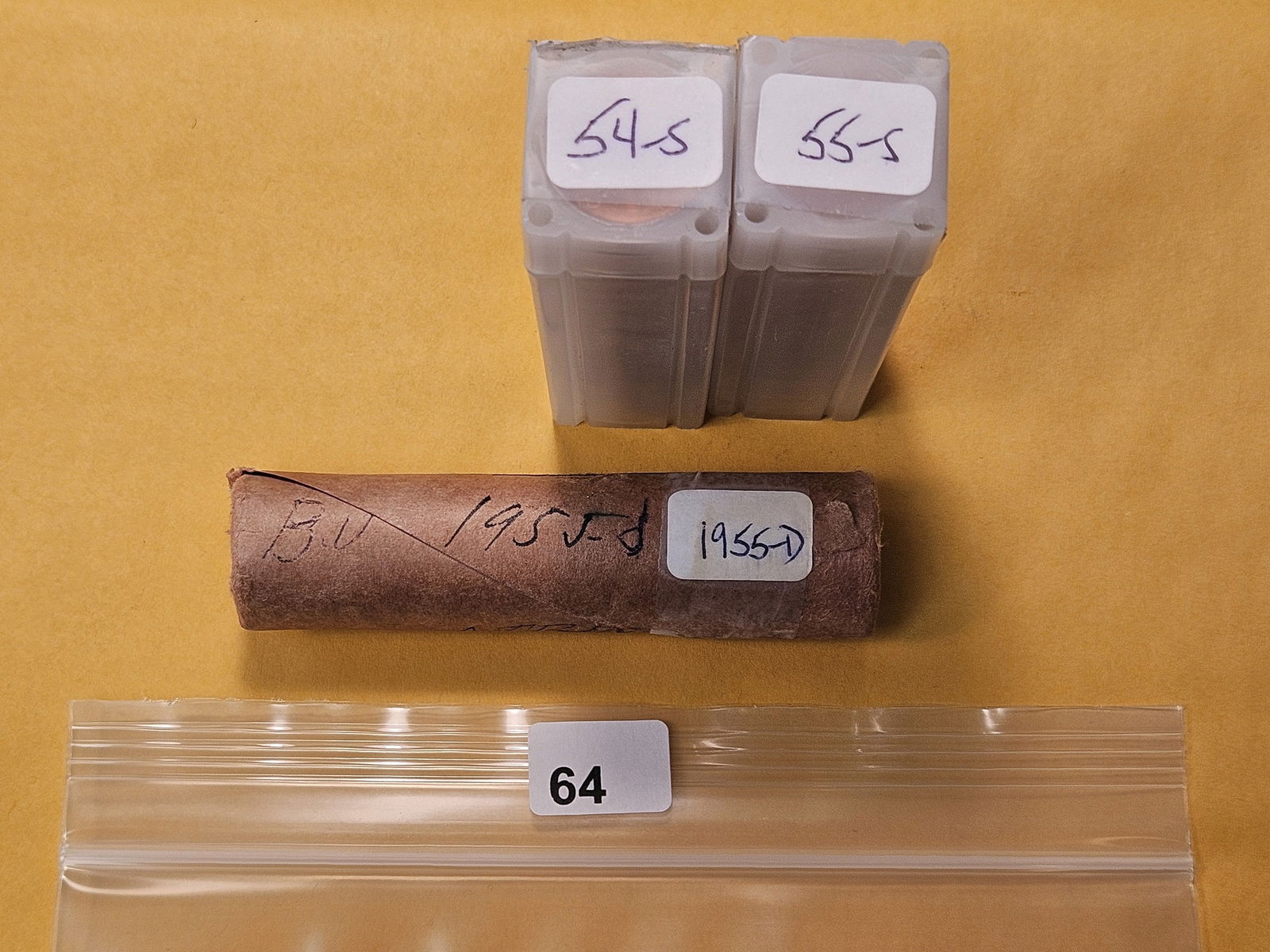 Three Rolls of Brilliant Uncirculated Wheat Cent Rolls: 1954-S and 1955-S, 1955-D in original bank-wrapped roll. From Dealer and unchecked by us 