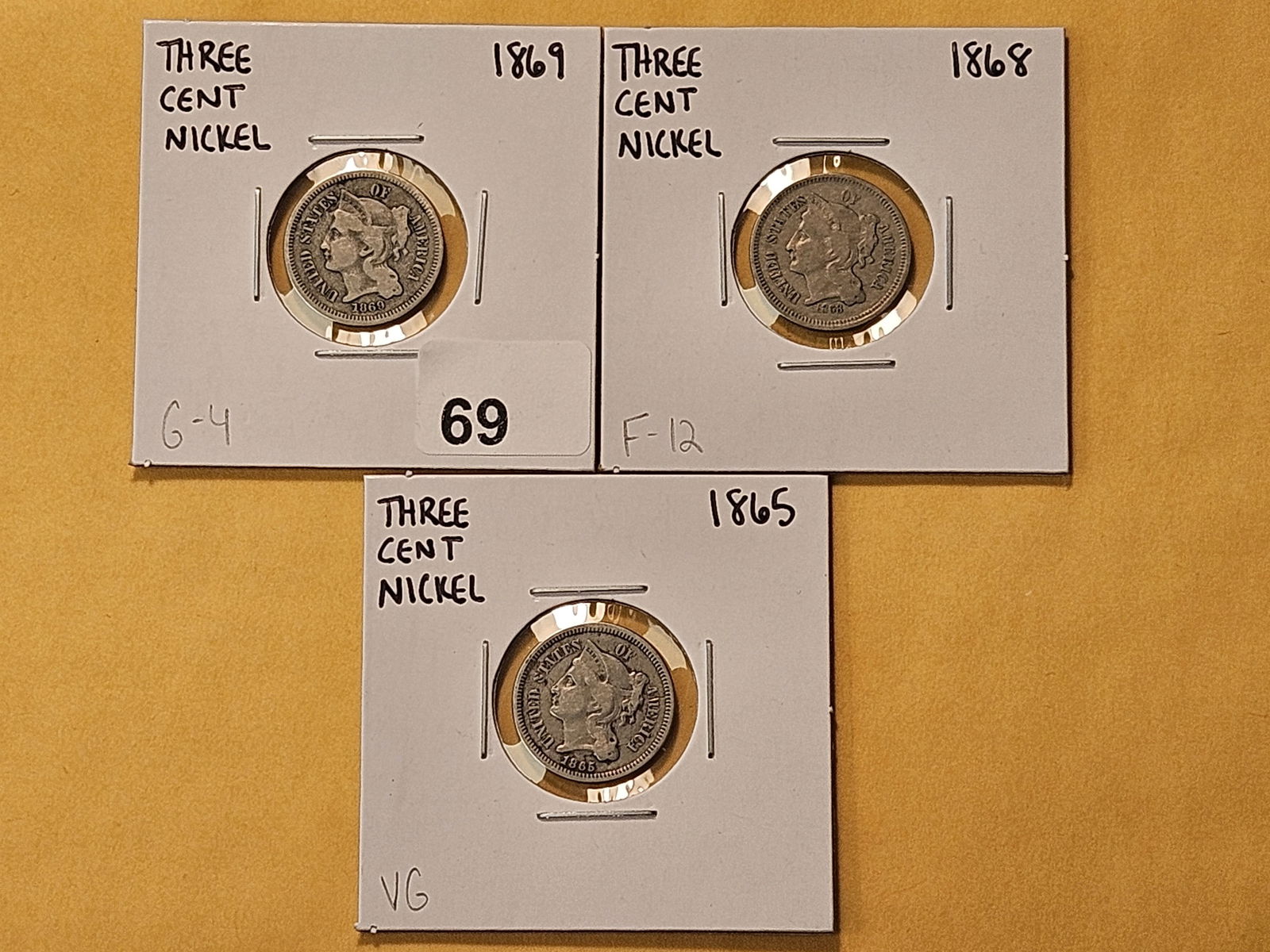 Three Circulated Three Cent Nickels: 1865, 1868 and 1869 