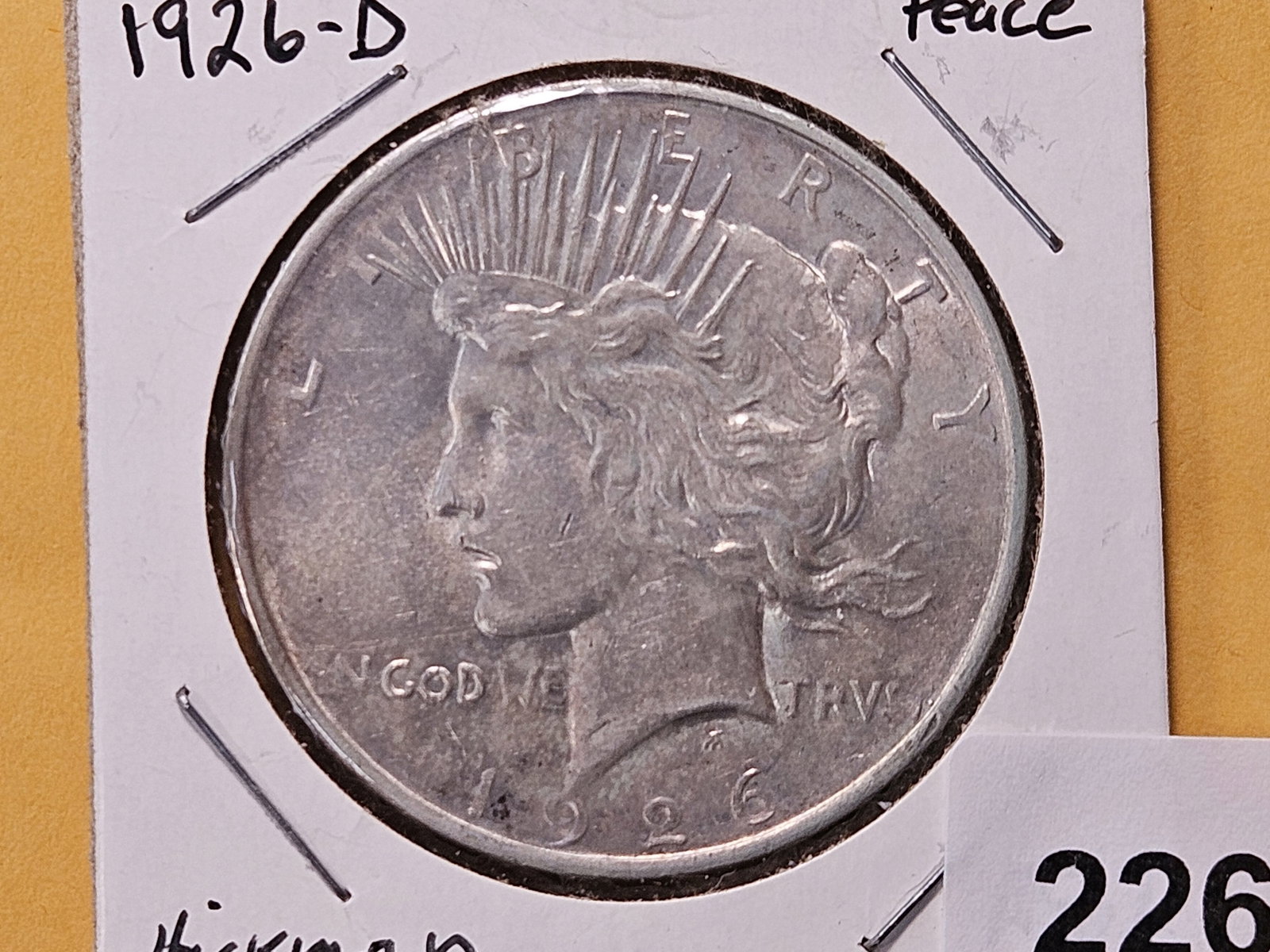 Better Grade 1926-D Peace Silver Dollar: Looks like some friction rubs on the wing 