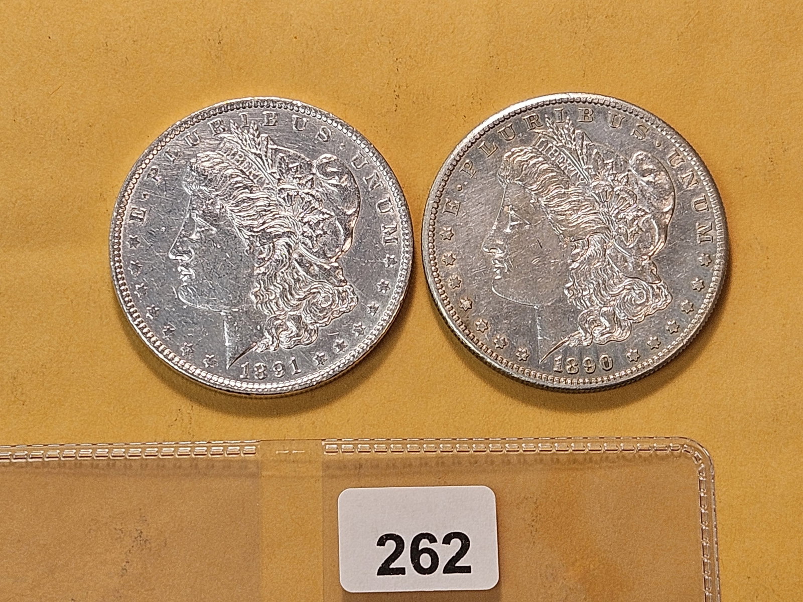 Two About Uncirculated Morgan Silver Dollars (1 of 4)