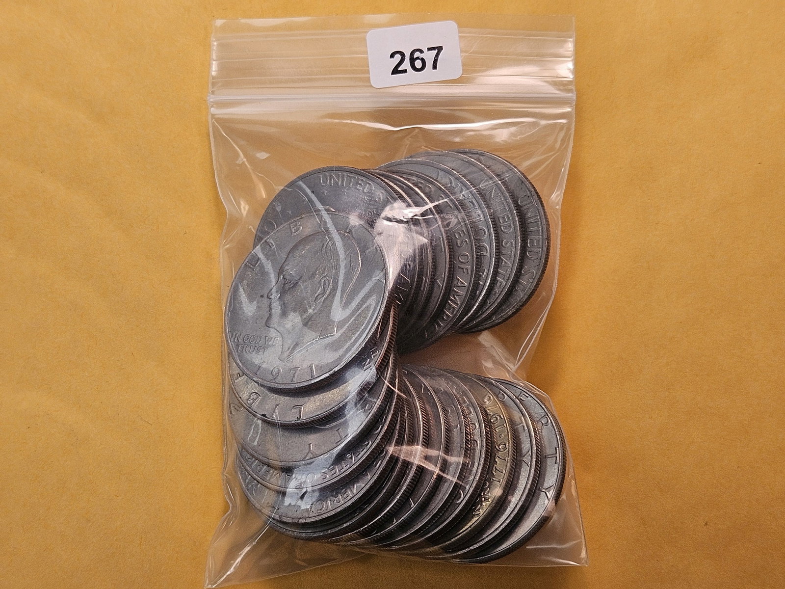 Twenty Clad Eisenhower Dollars: Mixed dates and grades 