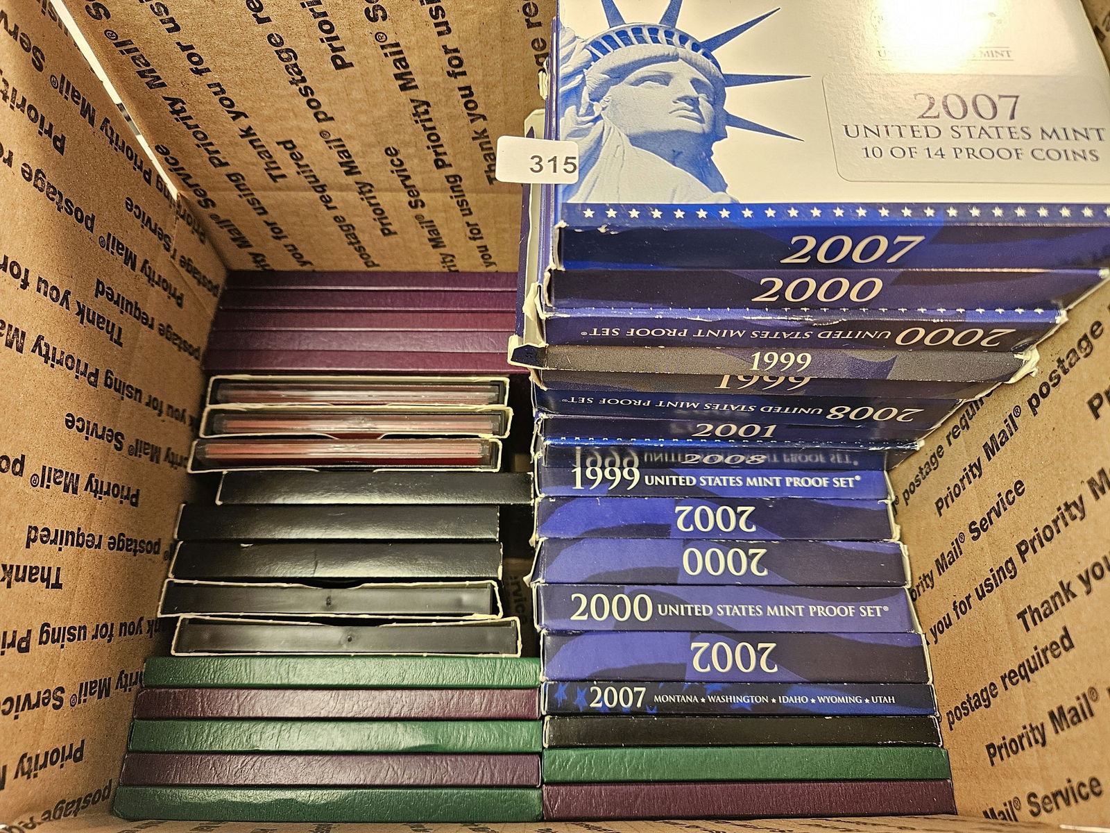 Forty United States Proof Sets: Mixed dates 1970's to 2008. Ships separately in Flat Rate Medium Box 
