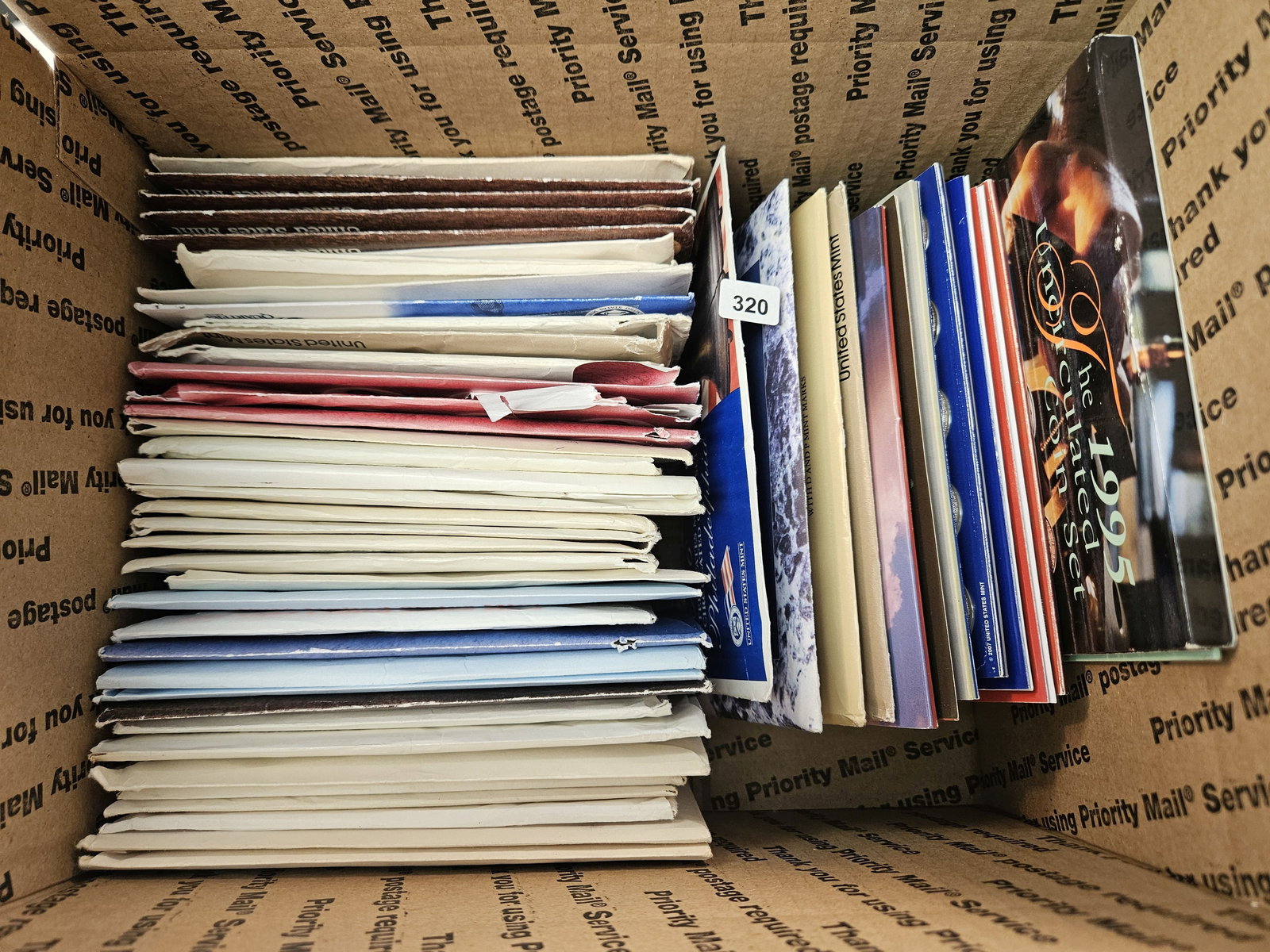 Fifty Mixed United States Uncirculated Coin Sets: Mixed dates 1970's to 2000's. Ships separately in Flat Rate Medium Box 