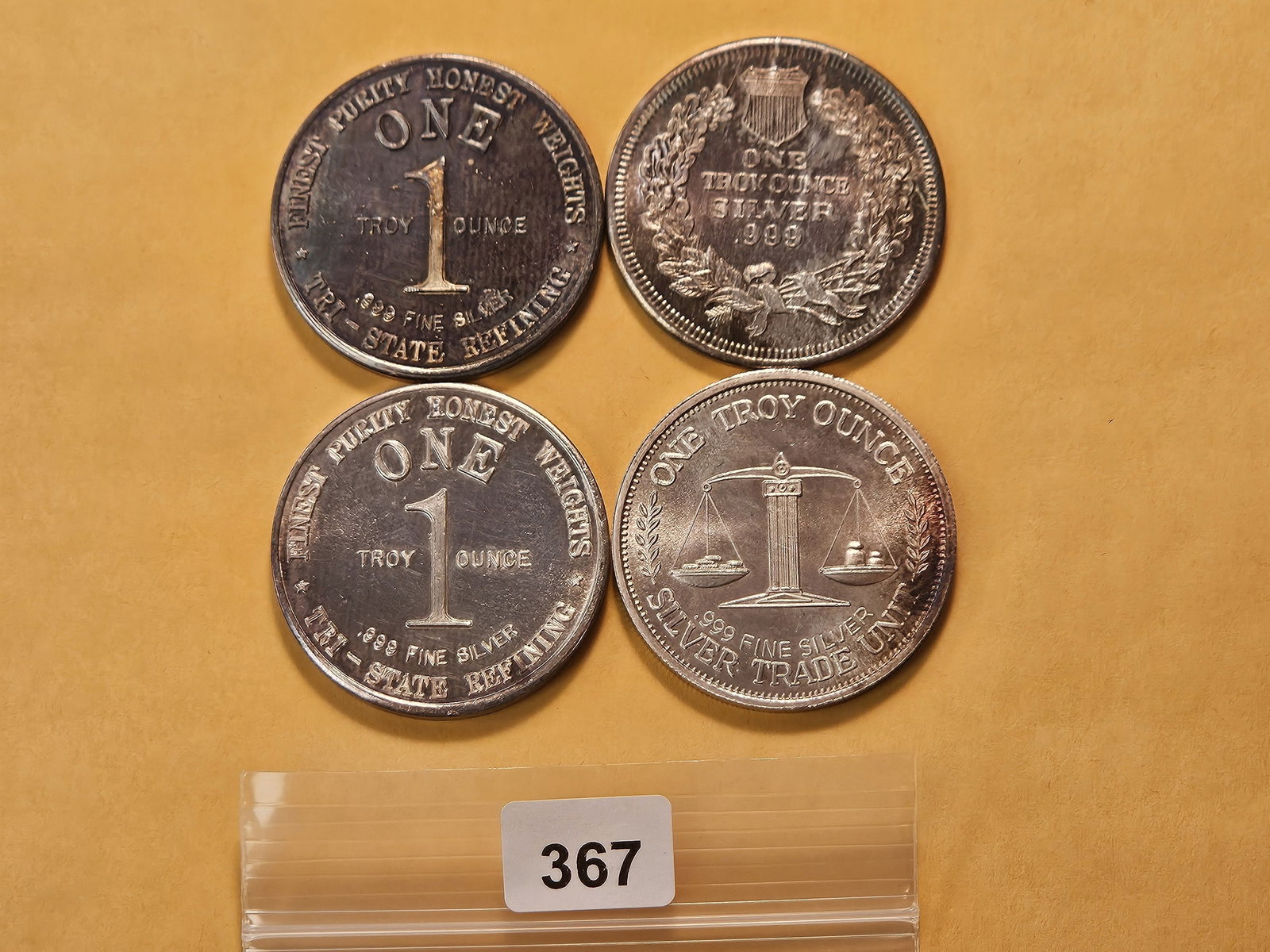 Four One Troy Ounce .999 Fine Silver Rounds: Two from Tri-State Refining, a Morgan design and an Indian Head design 