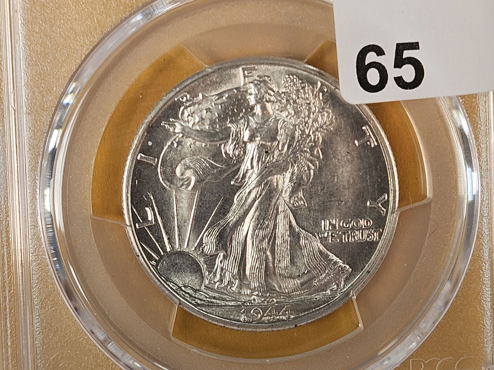 PCGS 1944-D Walking Liberty silver Half Dollar in Mint State 64: Good luster 